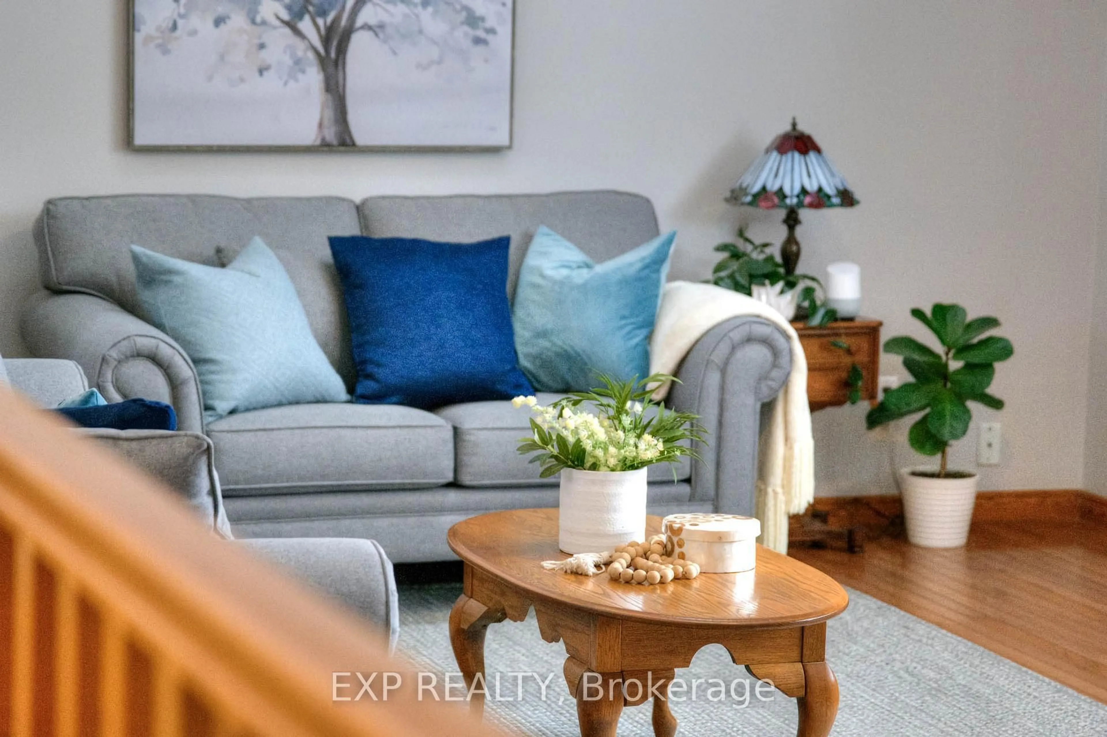 Living room with furniture, wood/laminate floor for 763 Sports Dr, Huron East Ontario N0G 1H0