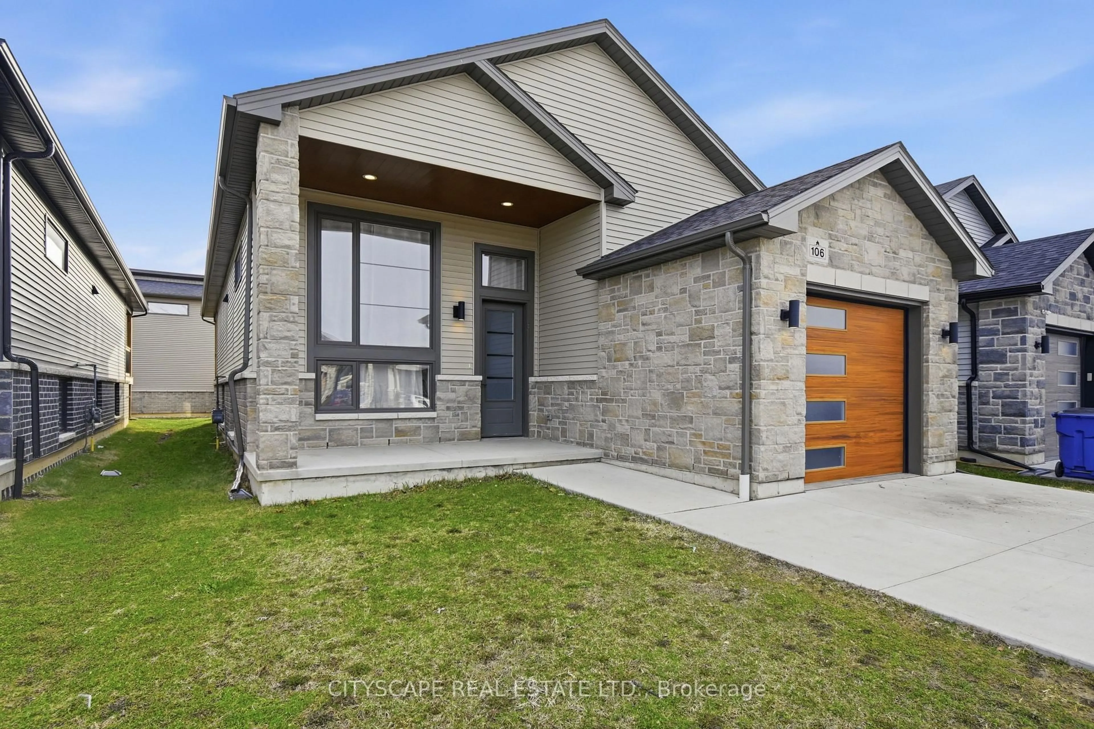 Home with brick exterior material, street for 106 Ironwood Tr, Chatham-Kent Ontario N7M 0T3