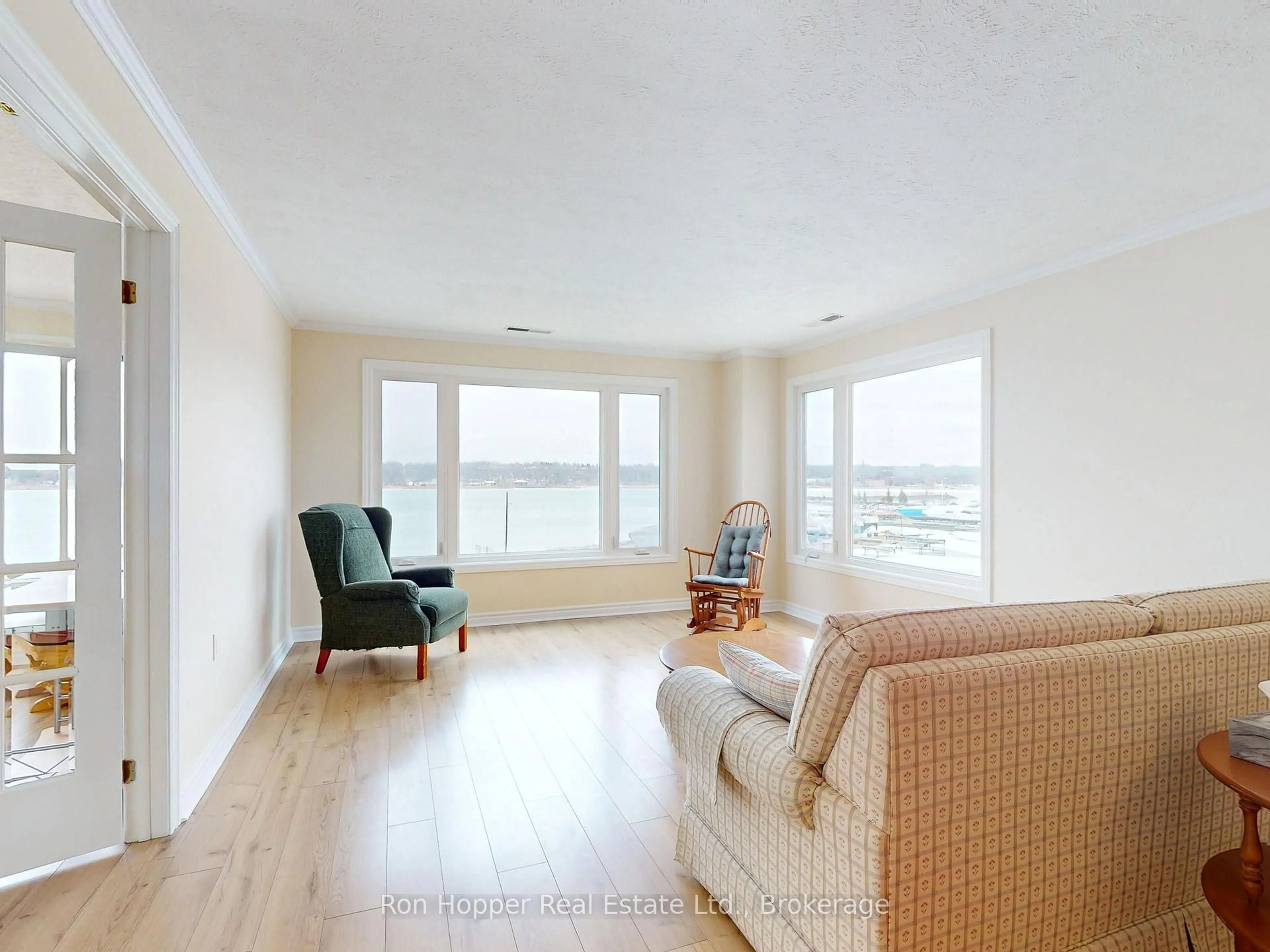 Living room with furniture, wood/laminate floor for 2555 3rd Ave #303, Owen Sound Ontario N4K 6T8