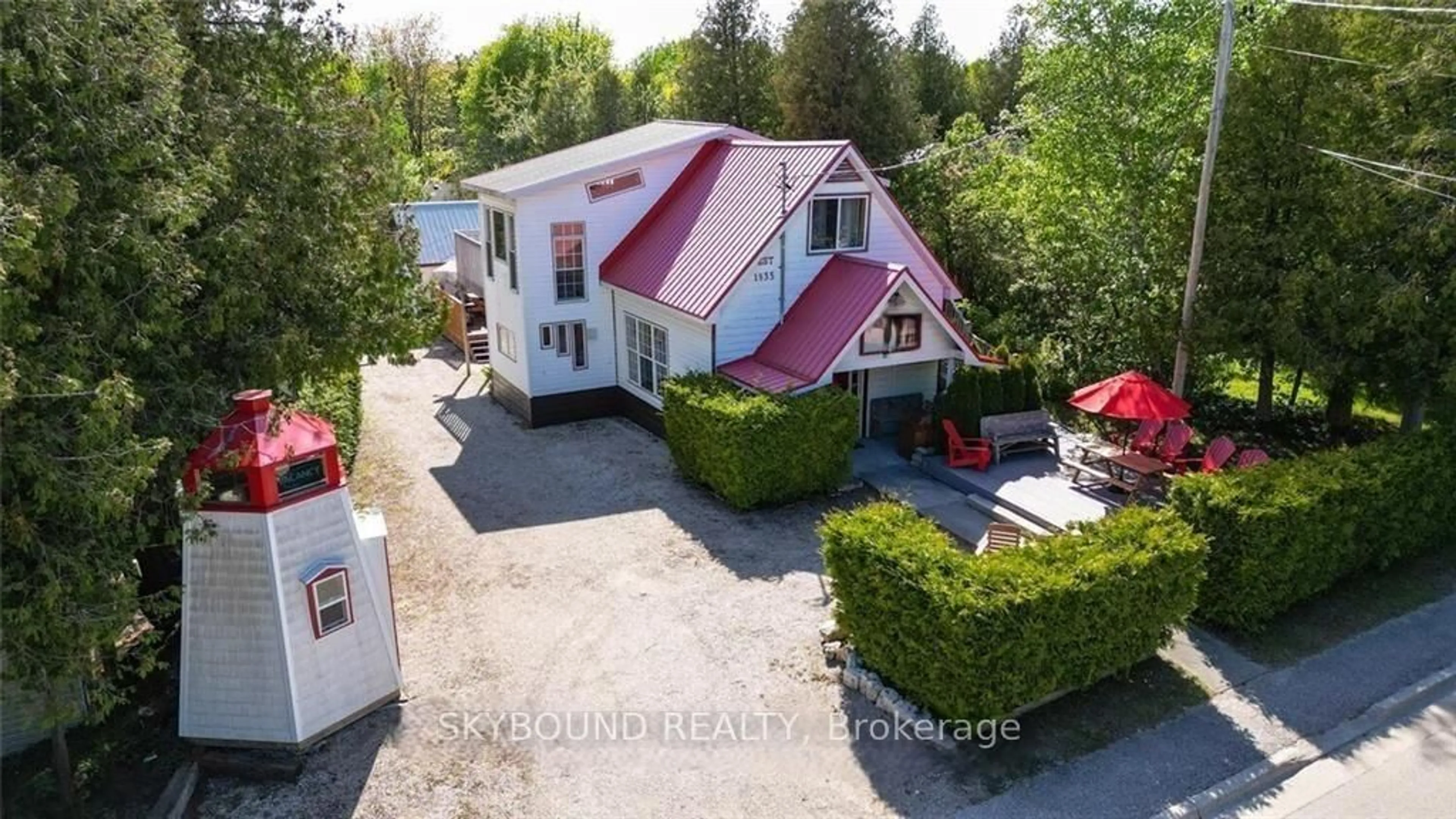 A pic from outside/outdoor area/front of a property/back of a property/a pic from drone, unknown for 7461 Highway 6, Northern Bruce Peninsula Ontario N0H 2R0