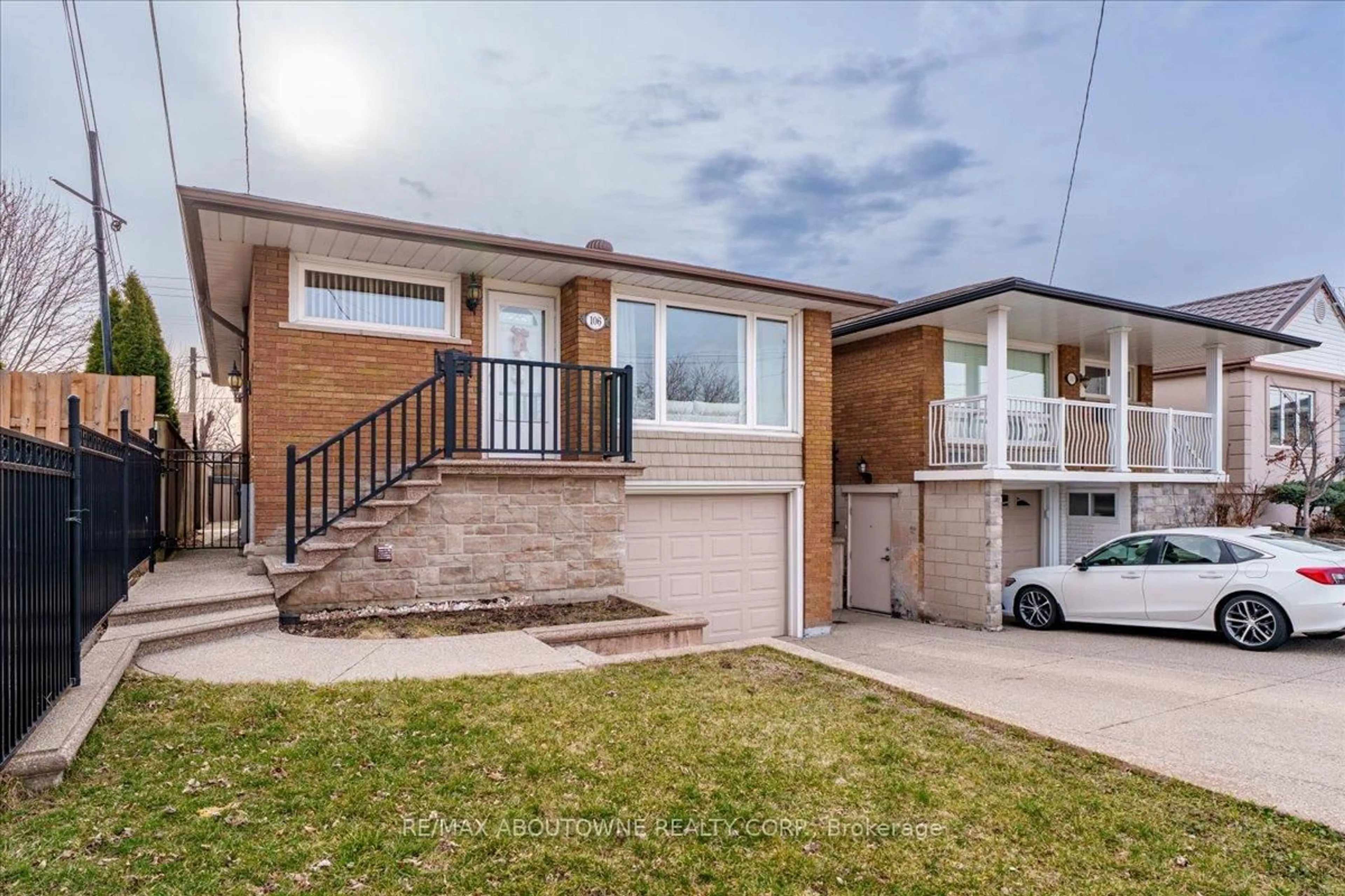 Home with brick exterior material, street for 106 Beland Ave, Hamilton Ontario L8H 6C1