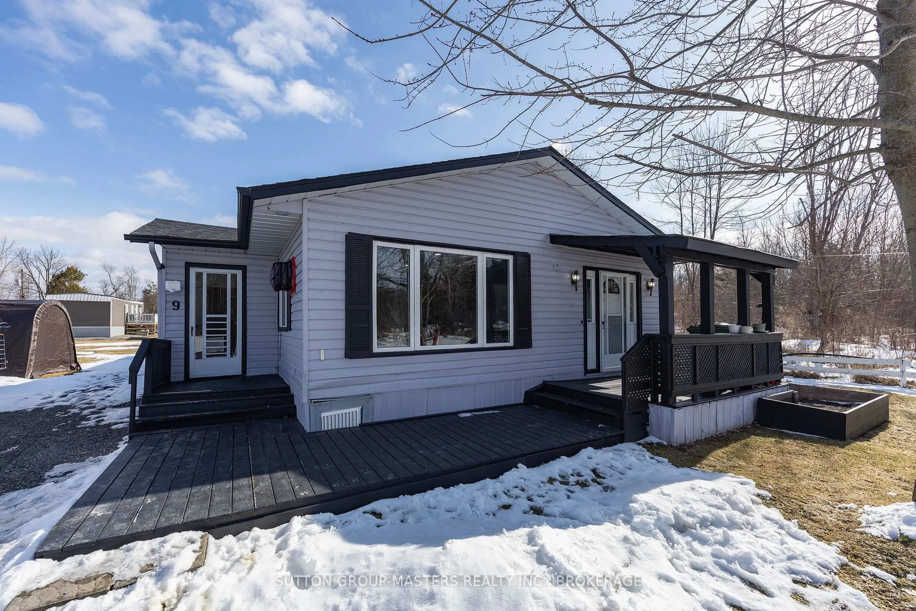 Home with vinyl exterior material, street for 9 Patterson Blvd, Rideau Lakes Ontario K0G 1E0