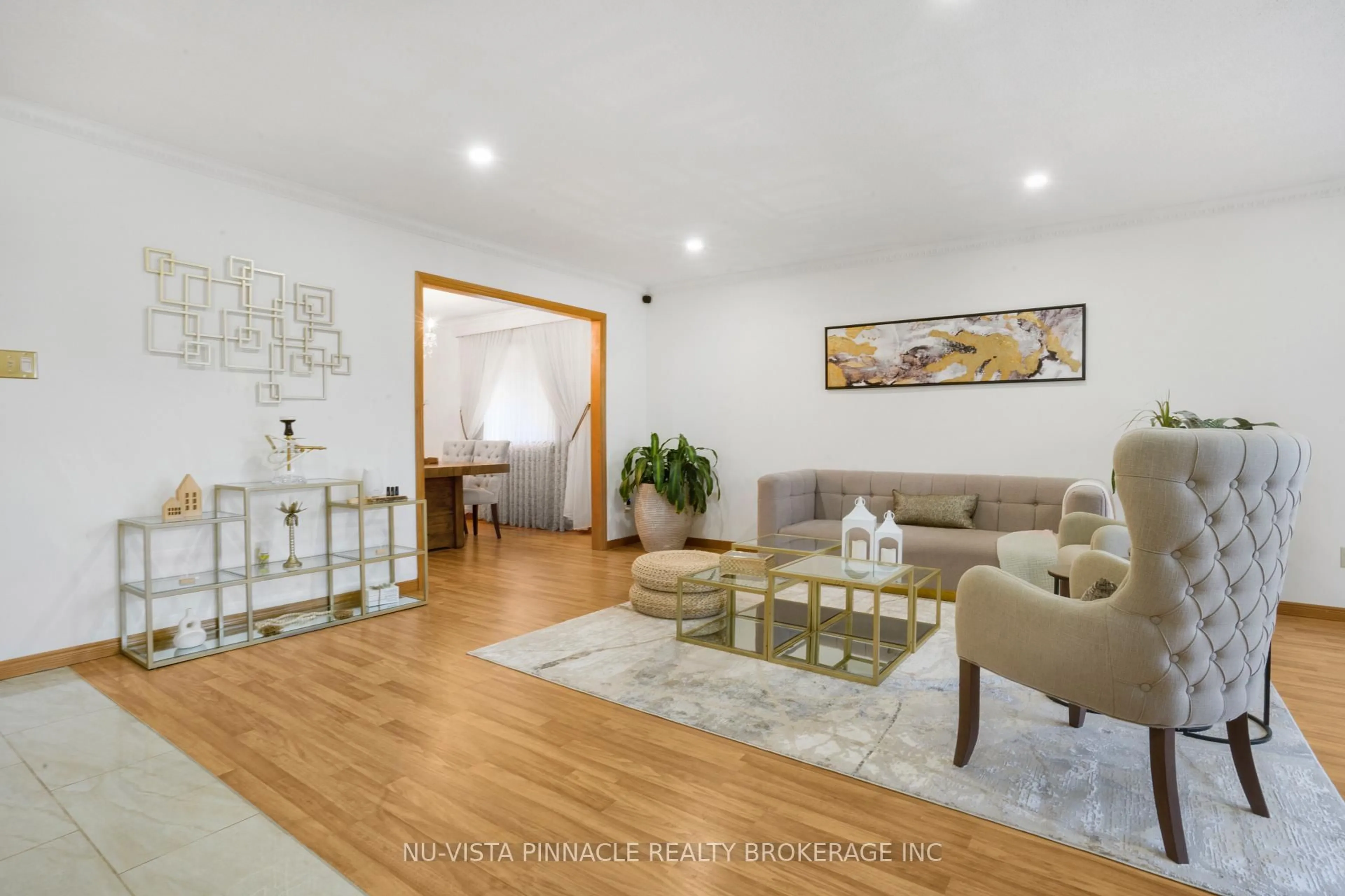 Living room with furniture, wood/laminate floor for 44 Golfdale Cres, London South Ontario N6C 5P2