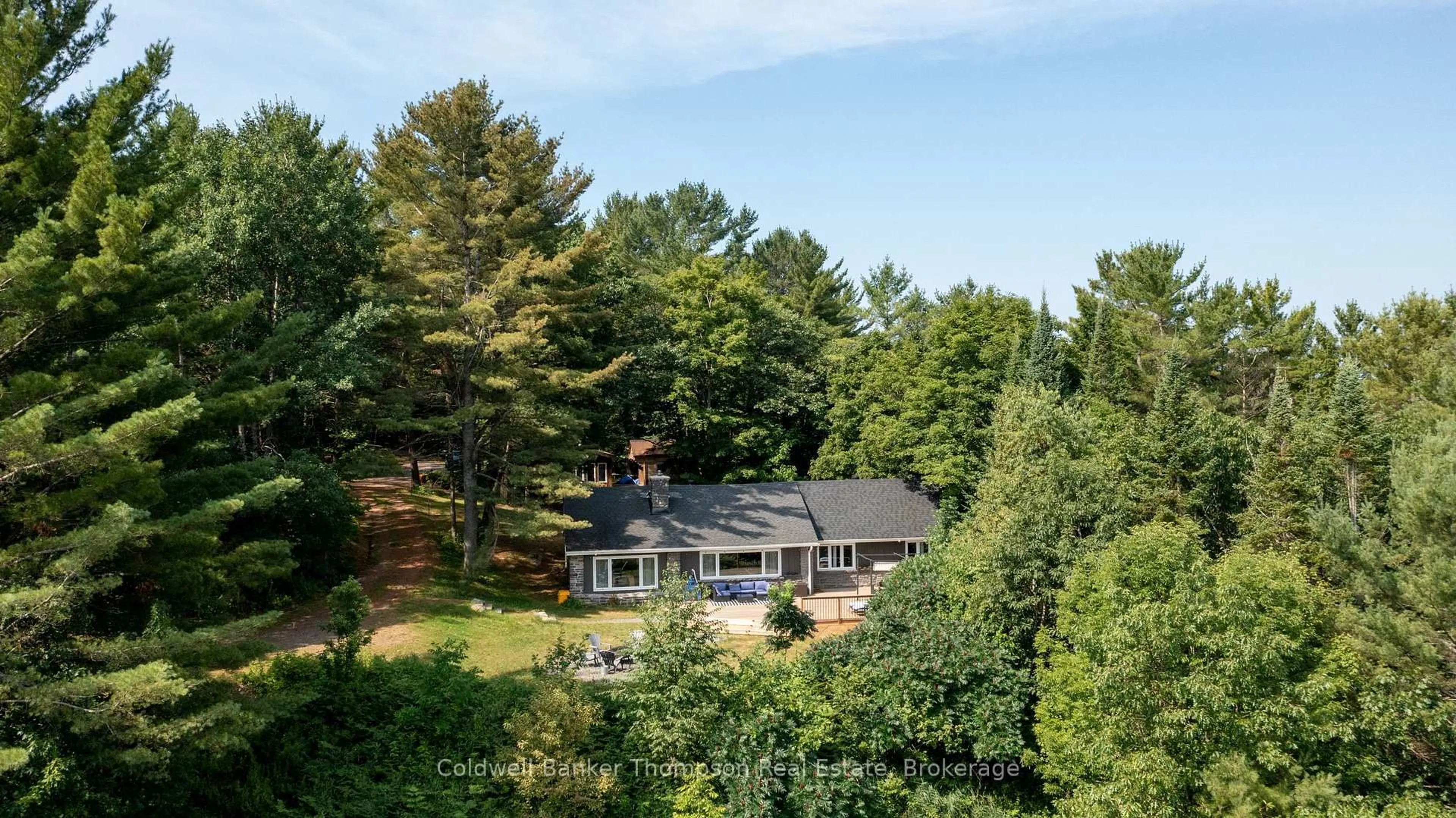 A pic from outside/outdoor area/front of a property/back of a property/a pic from drone, water/lake/river/ocean view for 179 Hoths Lane, Huntsville Ontario P0B 1L0