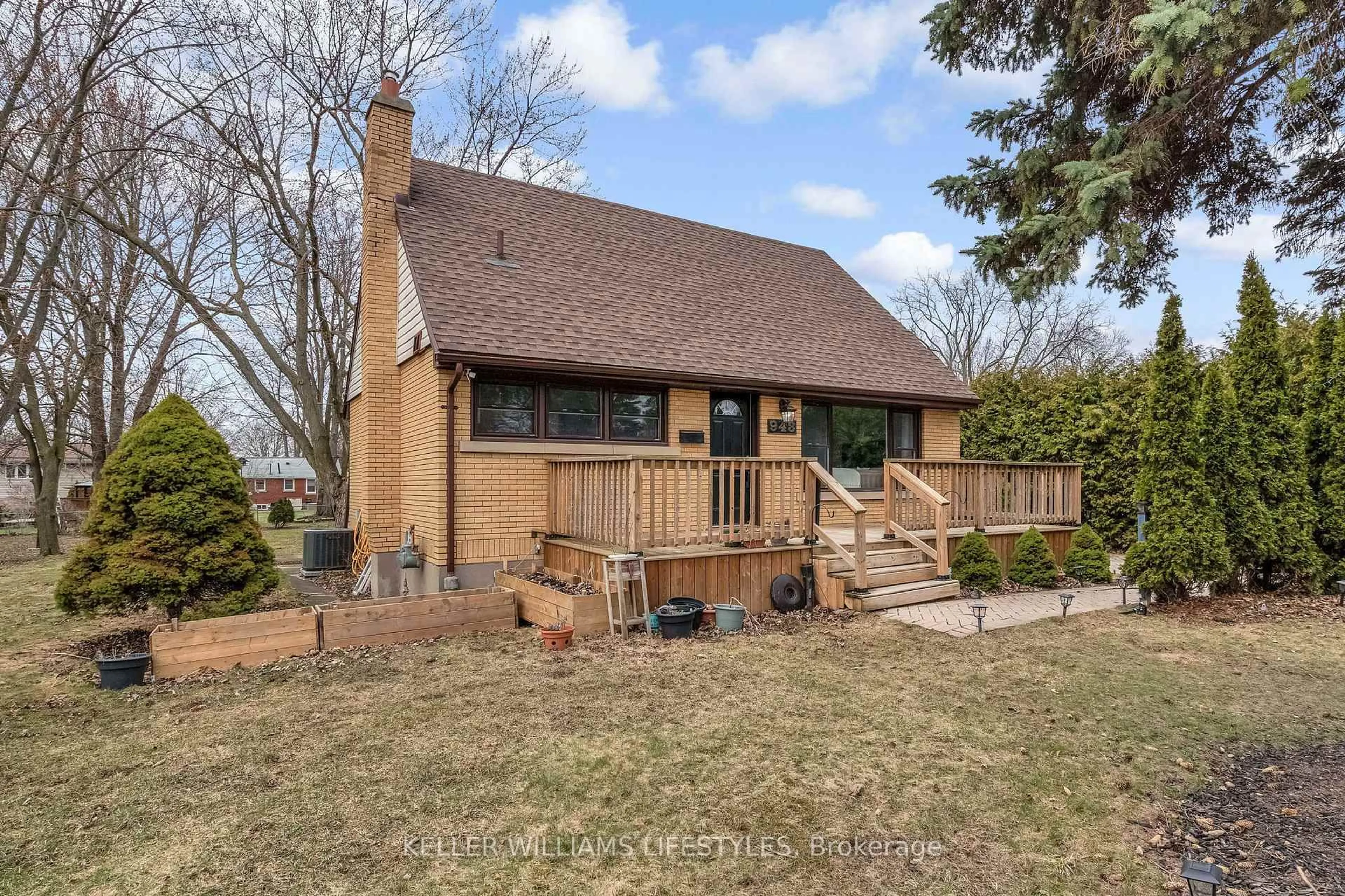 Home with brick exterior material, street for 943 Dearness Dr, London South Ontario N6E 1N6