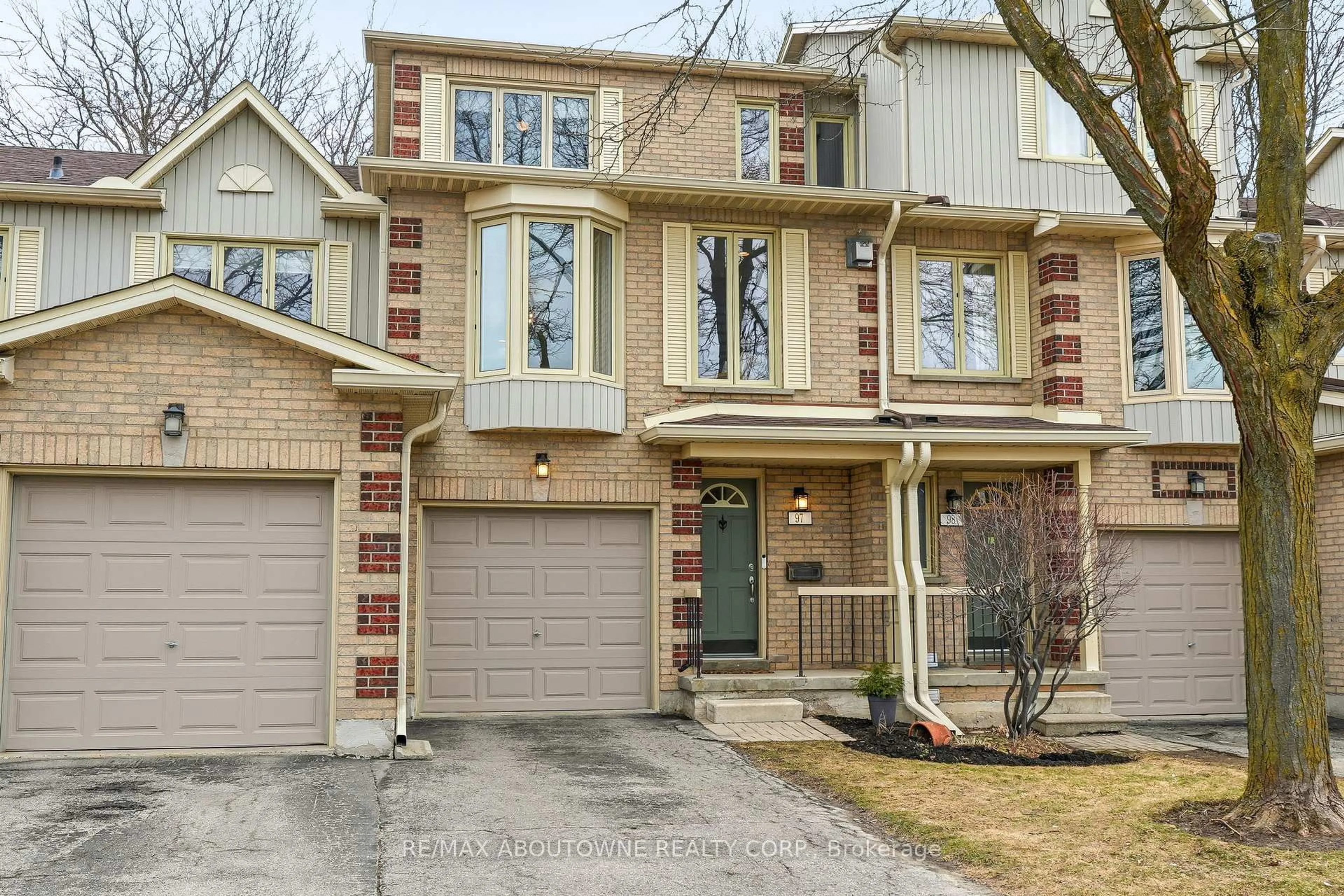 Home with brick exterior material, street for 302 College Ave #97, Guelph Ontario N1G 4T6