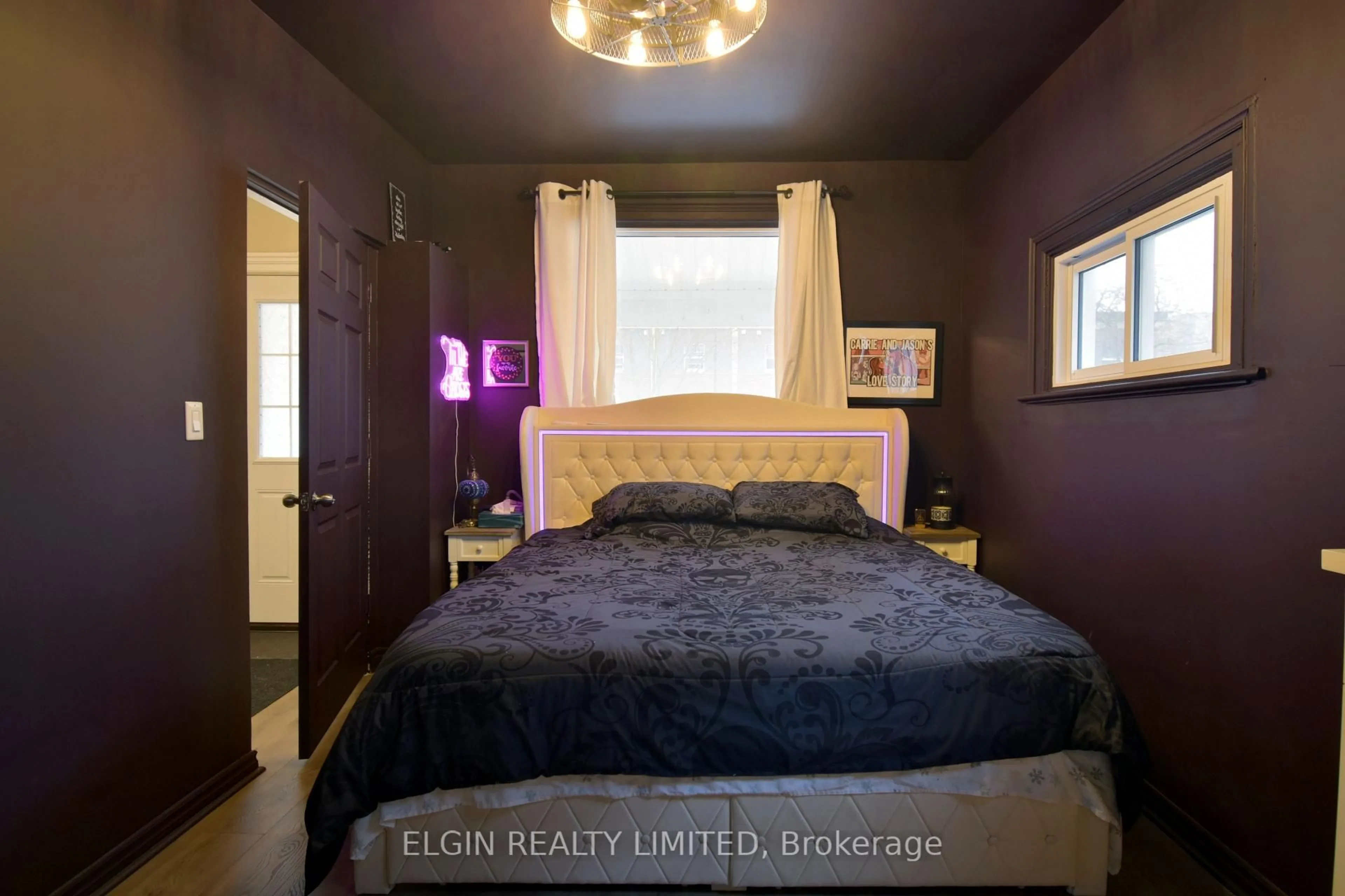 Bedroom with bed, wood/laminate floor for 57 Scott St, St. Thomas Ontario N5P 1K7