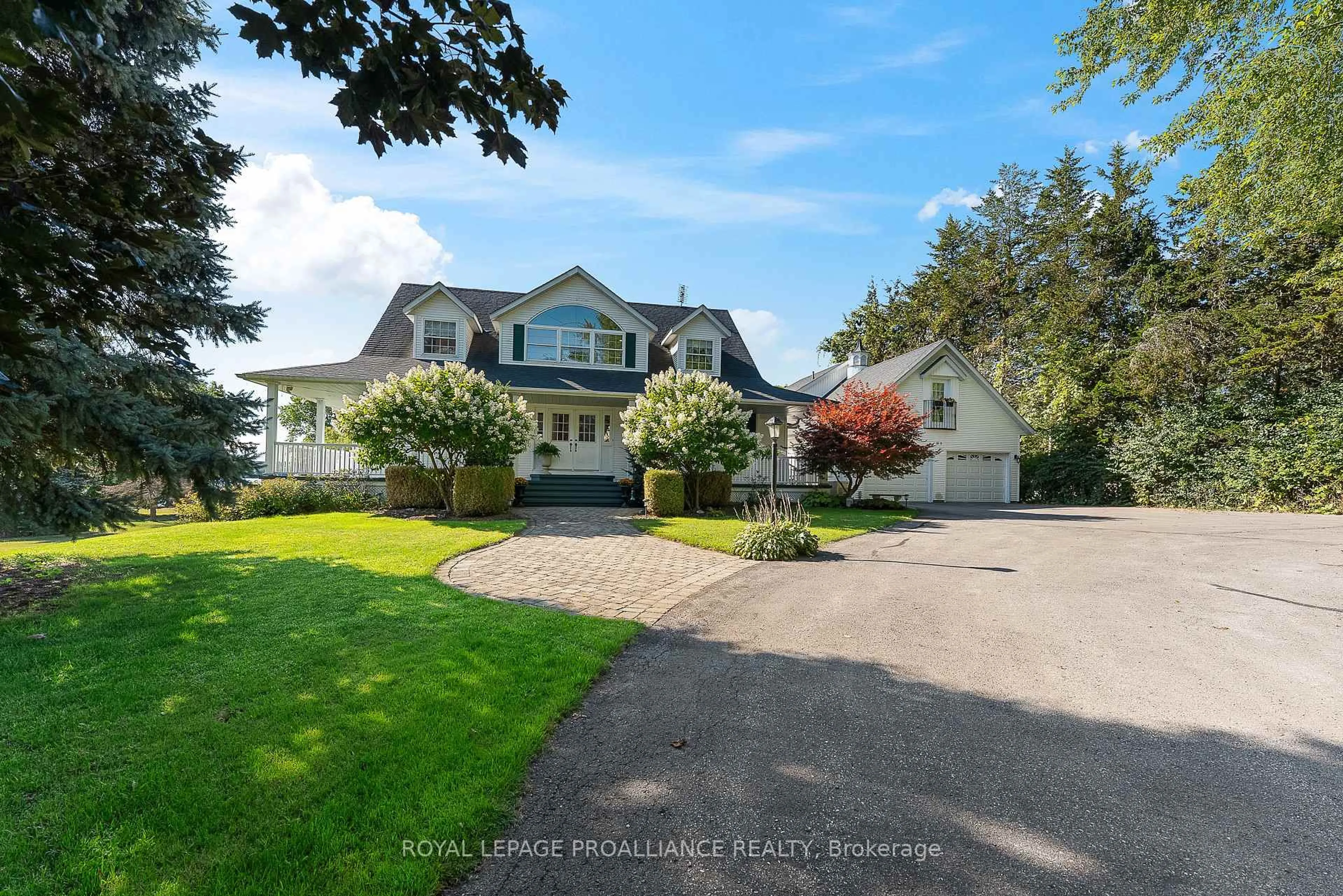 A pic from outside/outdoor area/front of a property/back of a property/a pic from drone, unknown for 630 Old Highway 2, Quinte West Ontario K8V 5P5