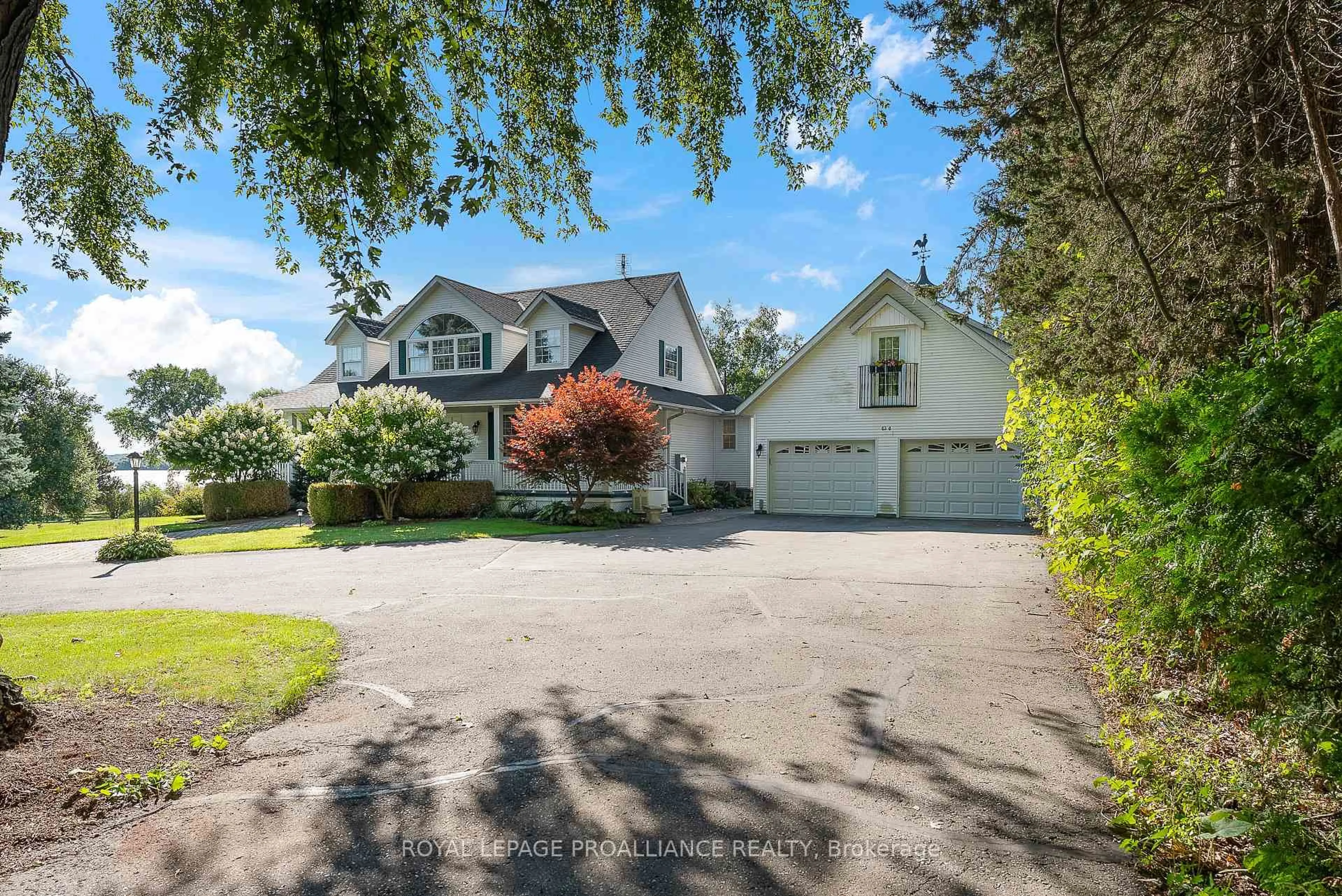 A pic from outside/outdoor area/front of a property/back of a property/a pic from drone, water/lake/river/ocean view for 630 Old Highway 2, Quinte West Ontario K8V 5P5