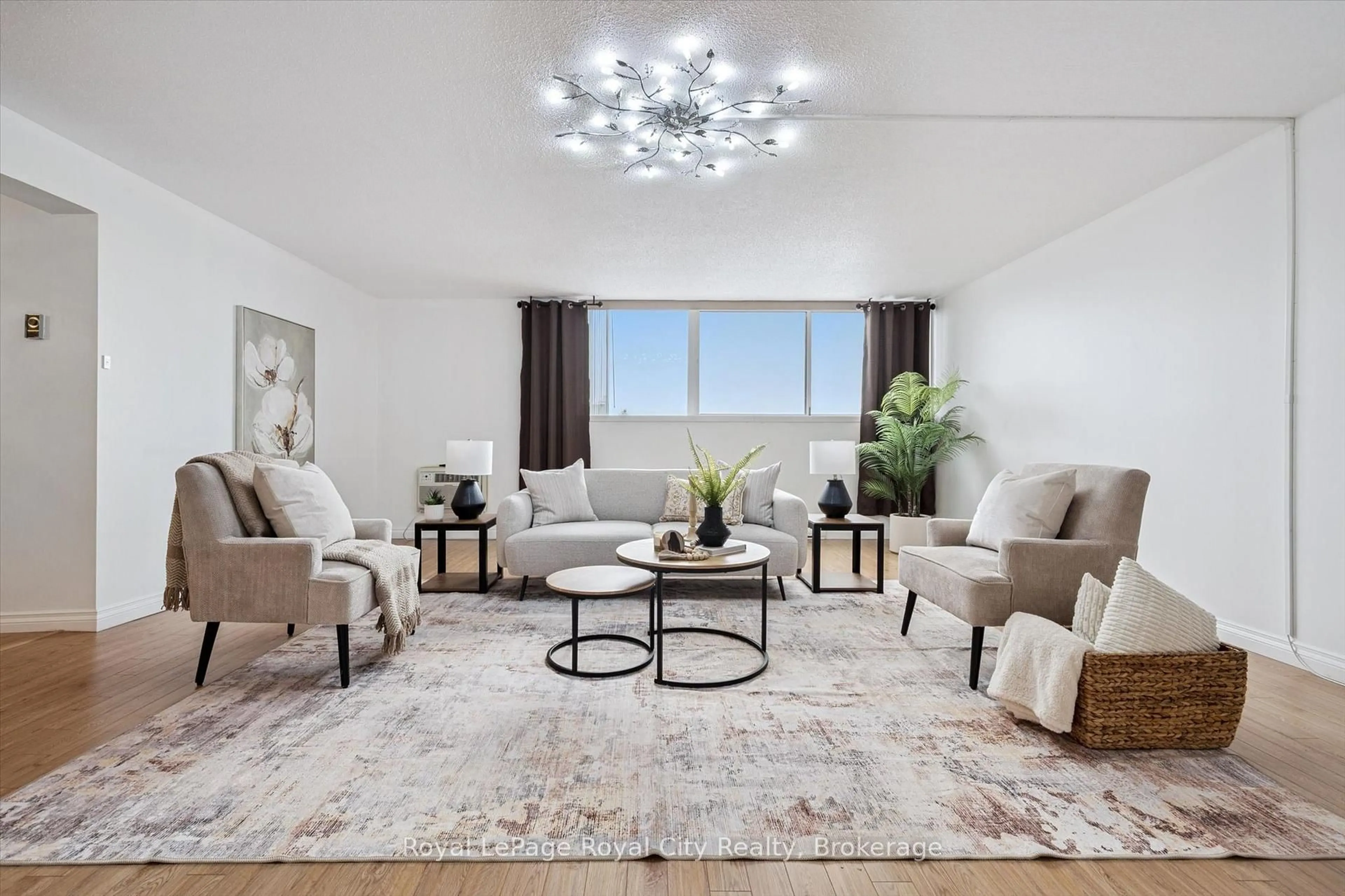 Living room with furniture, unknown for 93 Westwood Rd #607, Guelph Ontario N1H 7J7