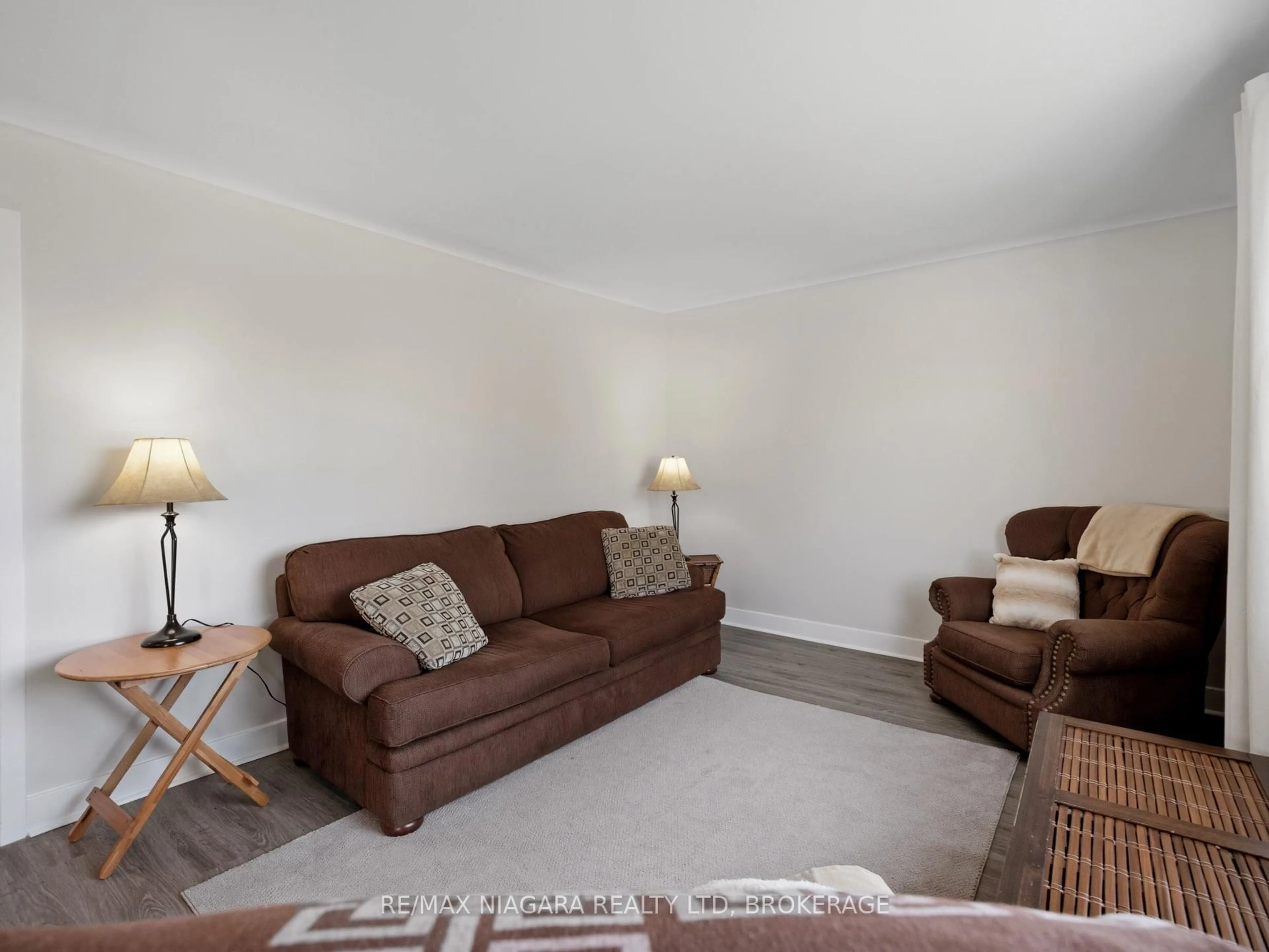 Living room with furniture, unknown for 7957 Beaverdams Rd, Niagara Falls Ontario L2H 1R7