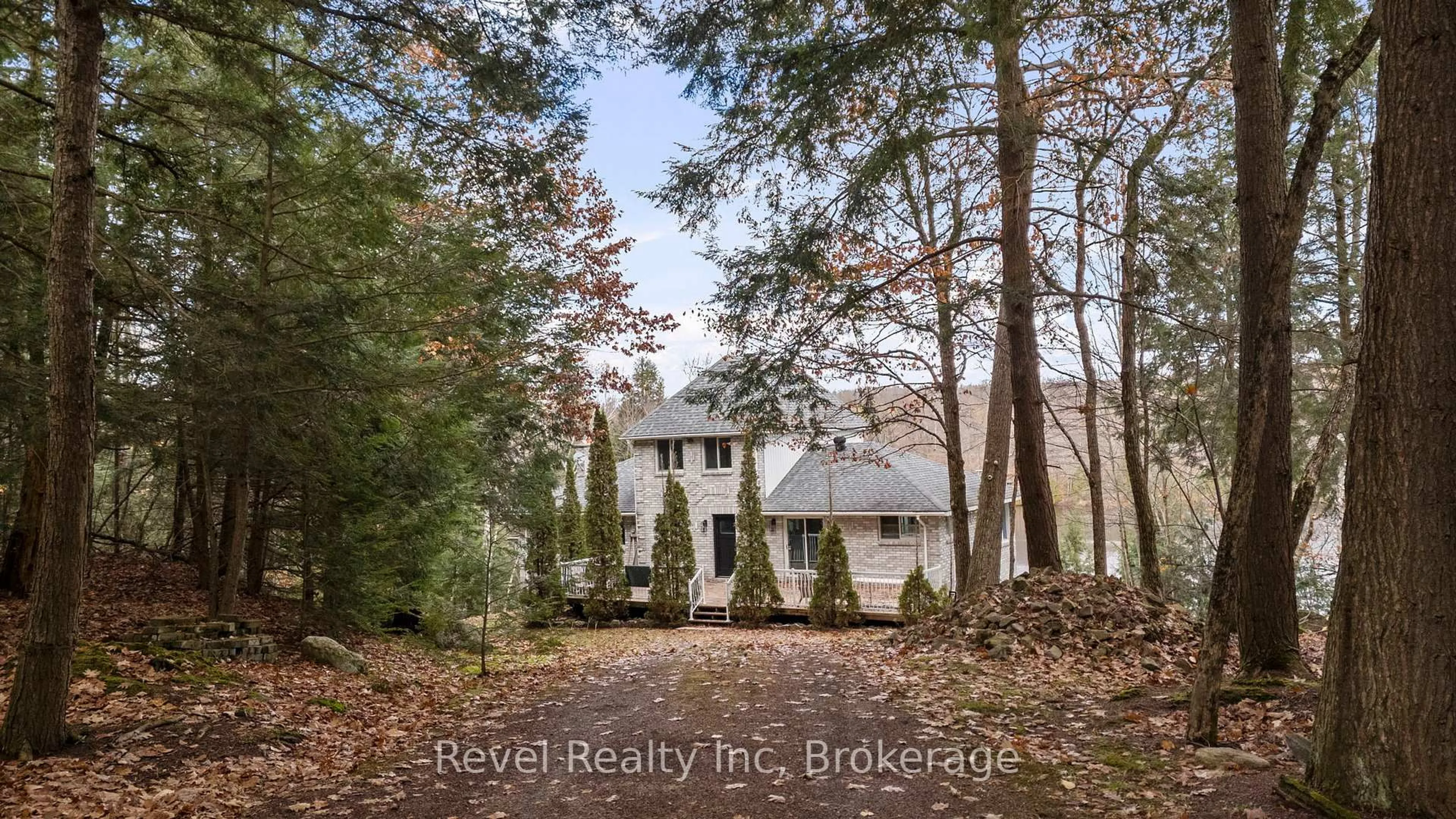 A pic from outside/outdoor area/front of a property/back of a property/a pic from drone, forest/trees view for 75 Silver Point Dr, Seguin Ontario P2A 2W8