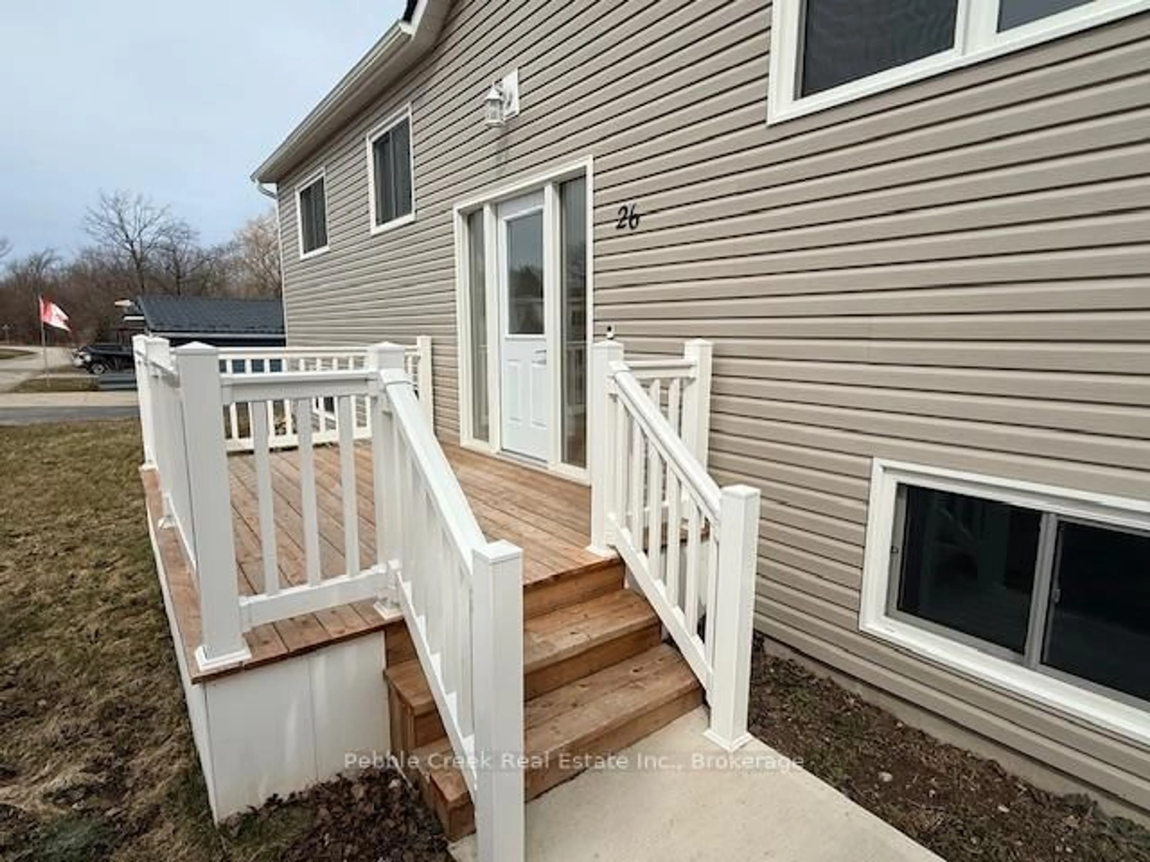 Home with vinyl exterior material, street for 26 Watergate Dr, Ashfield-Colborne-Wawanosh Ontario N7A 3Y3