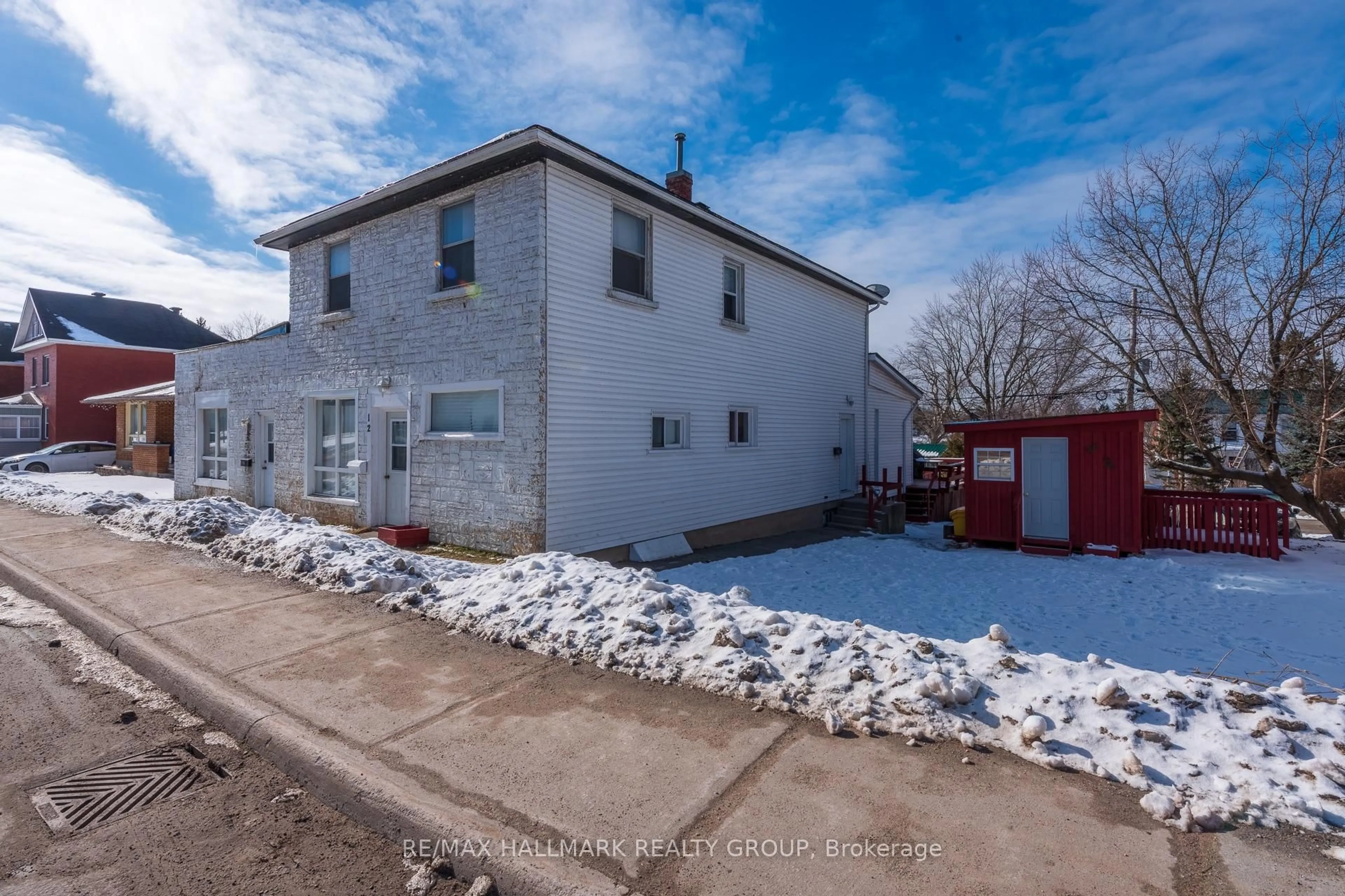 A pic from outside/outdoor area/front of a property/back of a property/a pic from drone, street for 12 - 14 Queen St, Smiths Falls Ontario K7A 3N2