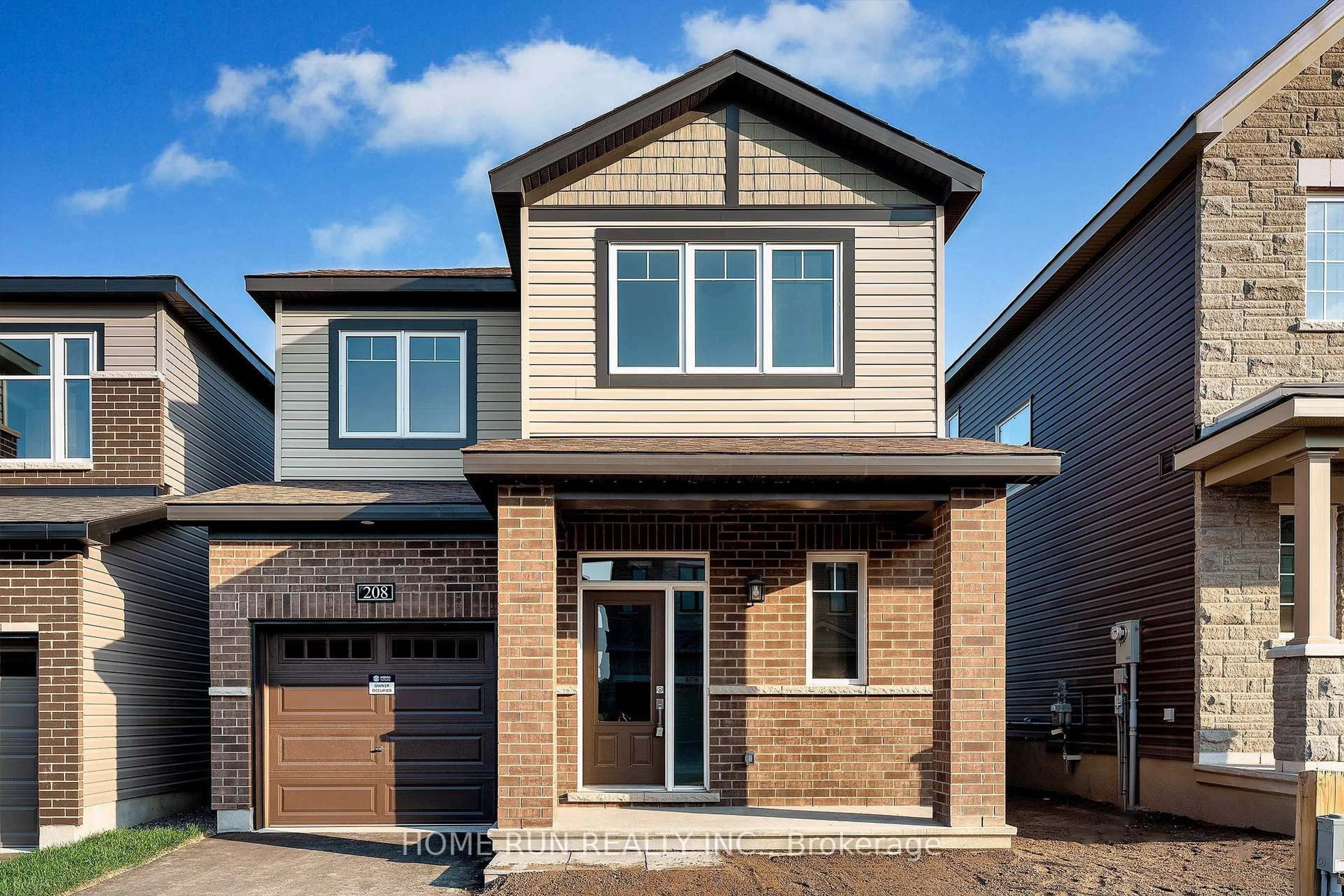 Home with brick exterior material, street for 208 Elsie Macgill Walk, Ottawa Ontario K2W 0L5