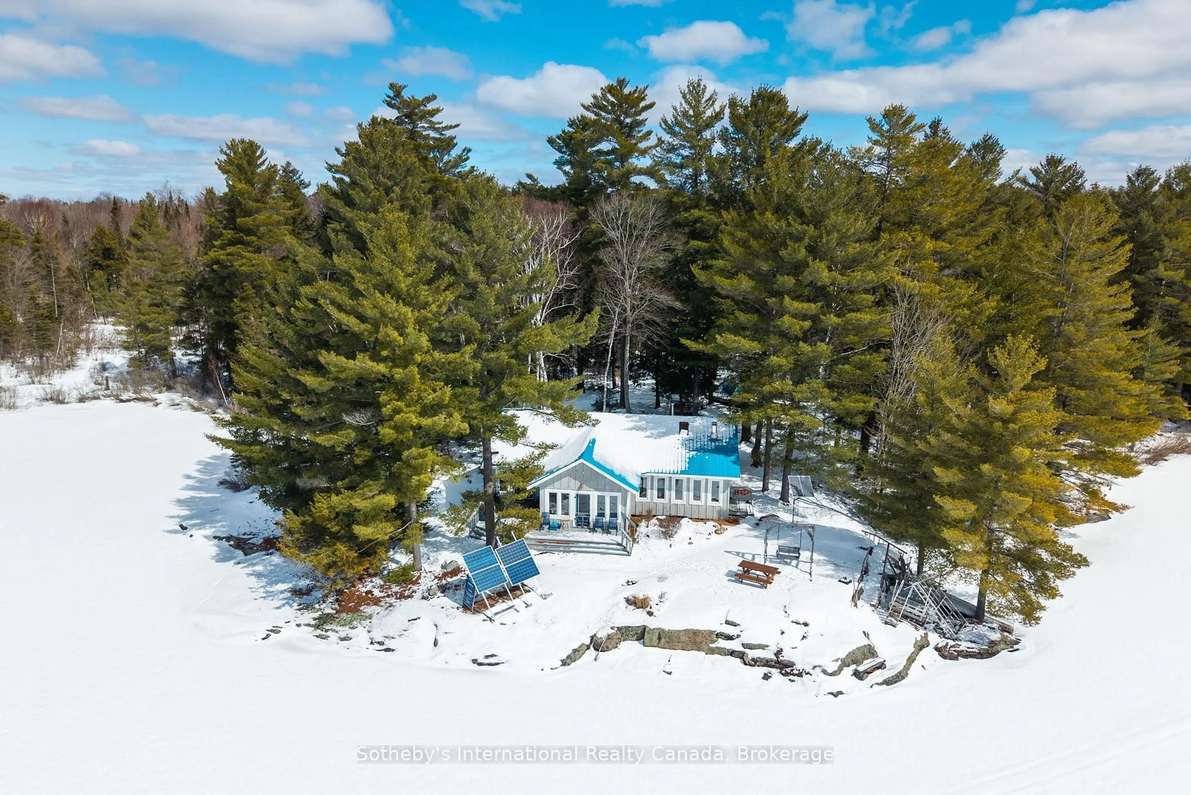 A pic from outside/outdoor area/front of a property/back of a property/a pic from drone, water/lake/river/ocean view for 3301B Axe Lake Rd, McMurrich/Monteith Ontario P0A 1Y0