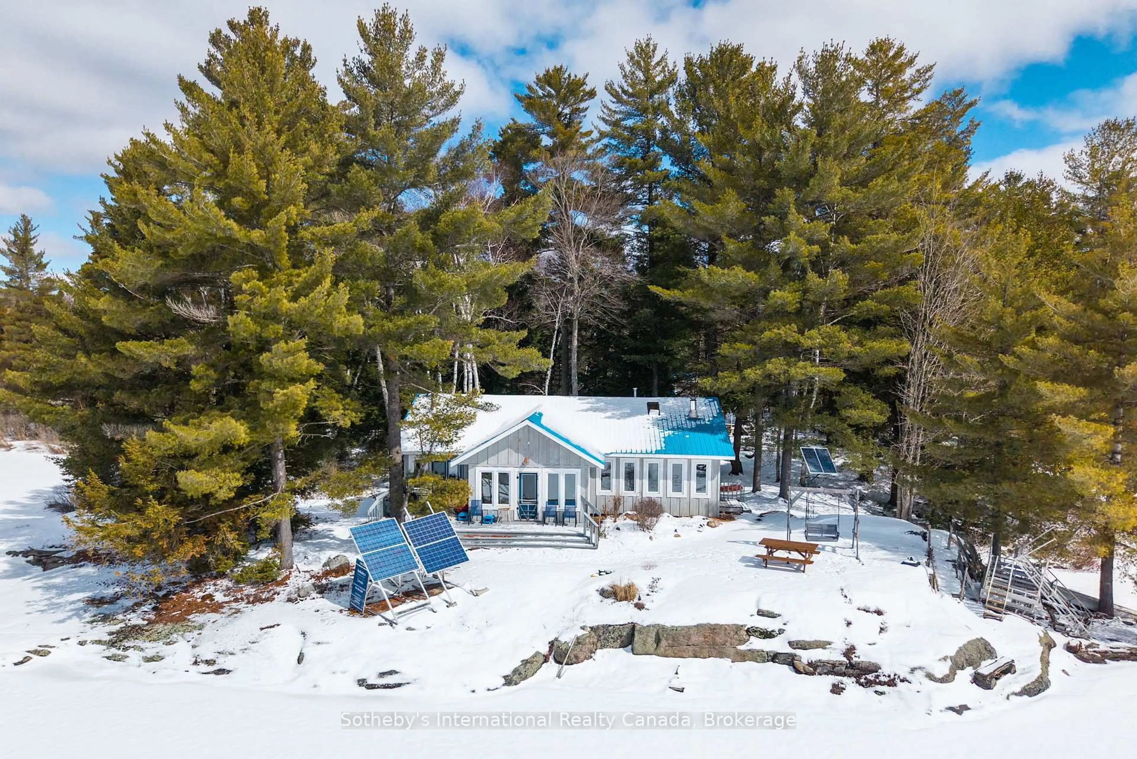 A pic from outside/outdoor area/front of a property/back of a property/a pic from drone, water/lake/river/ocean view for 3301B Axe Lake Rd, McMurrich/Monteith Ontario P0A 1Y0