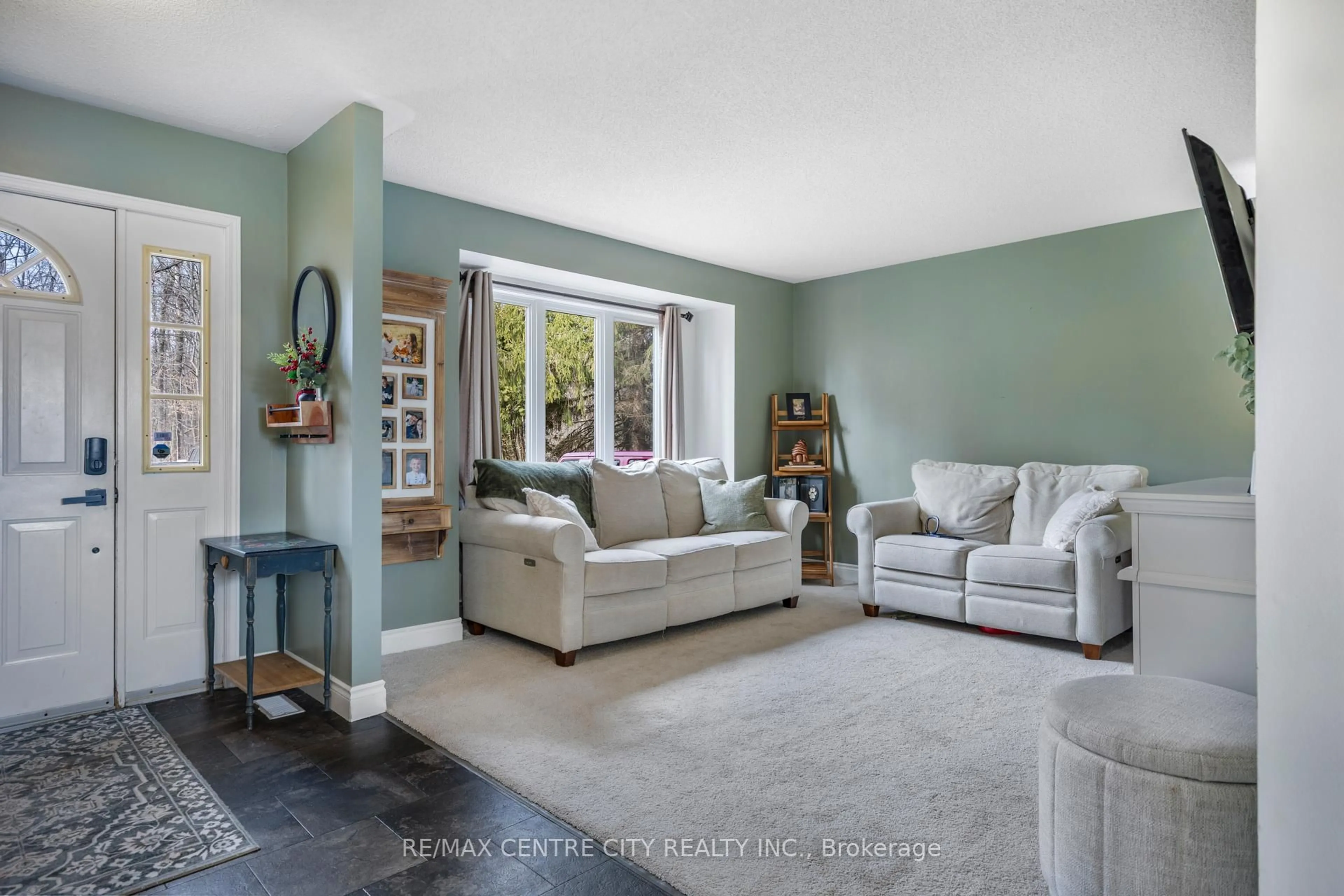 Living room with furniture, unknown for 2623 Avon Dr, Malahide Ontario N0L 1B0