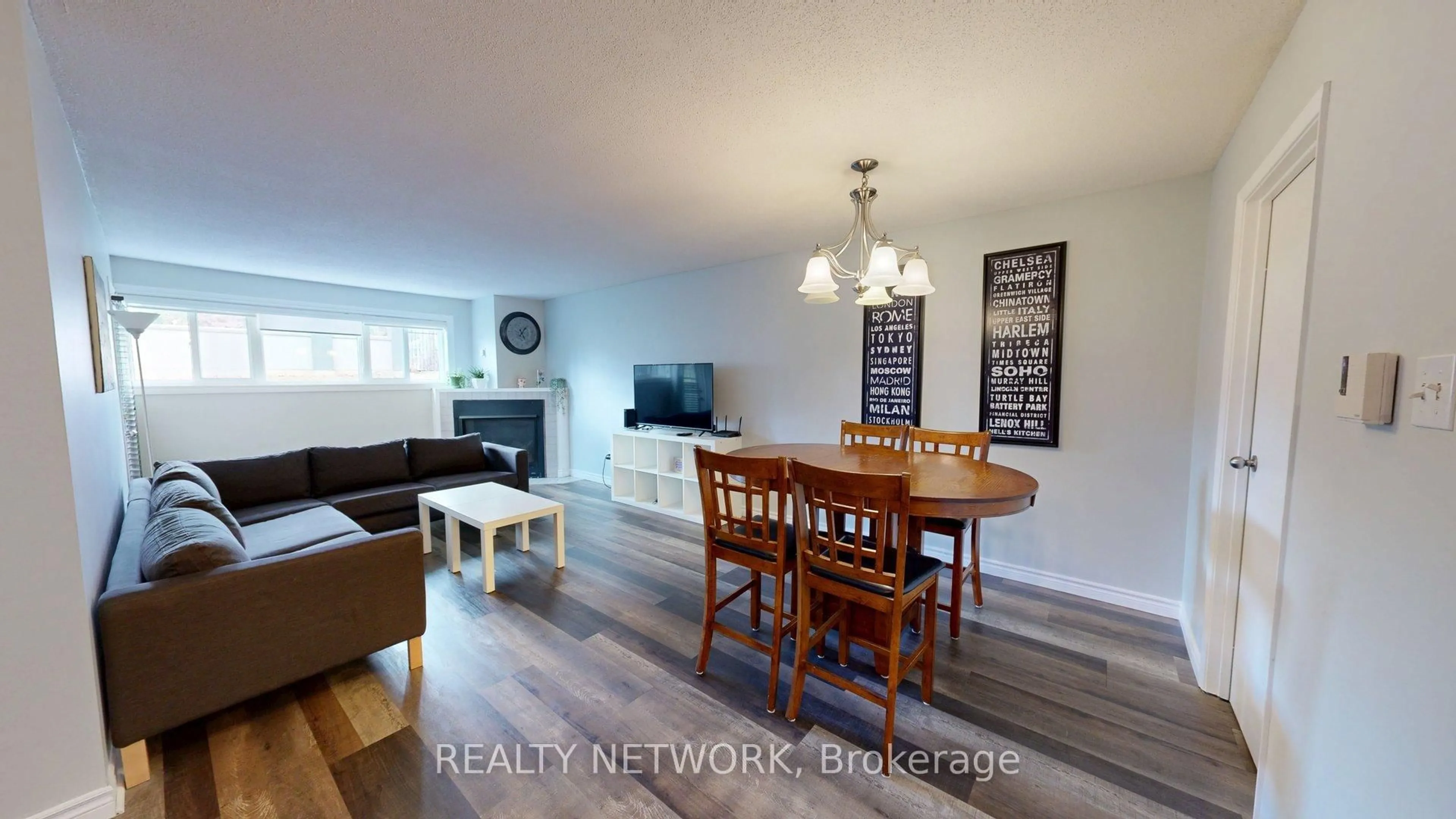Living room with furniture, wood/laminate floor for 15 JACKSWAY Cres #117, London North Ontario N5X 3T8