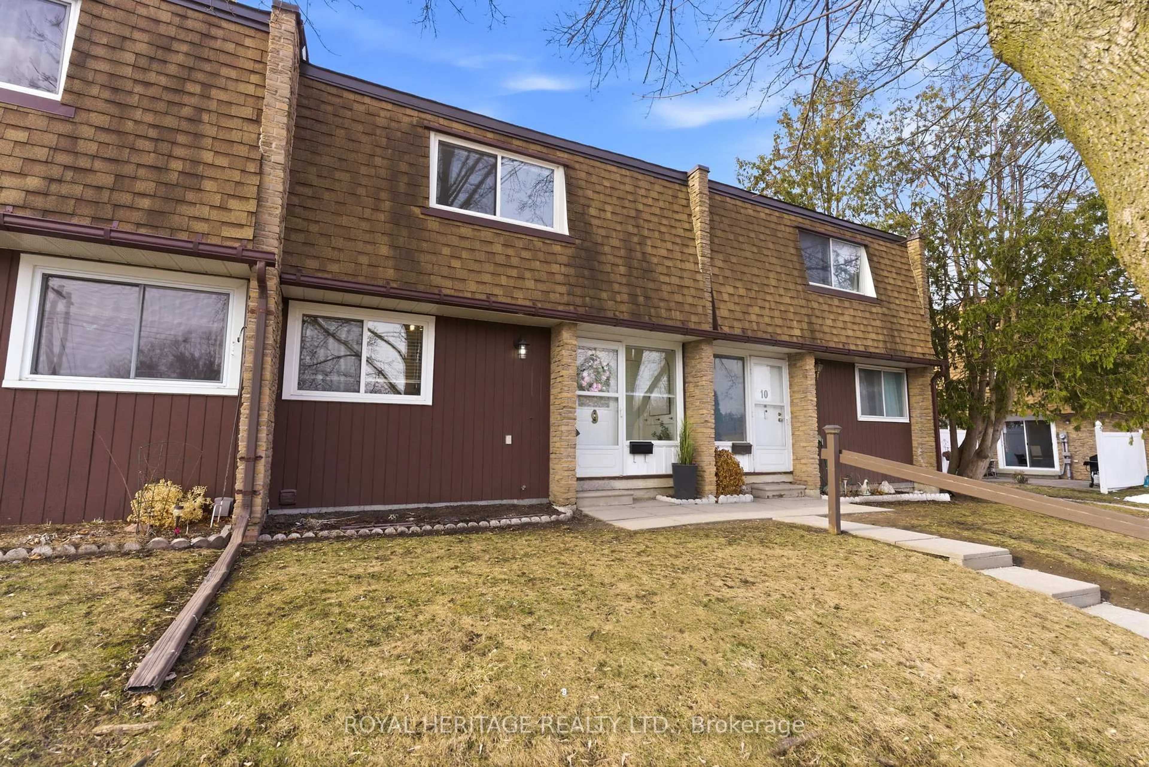 Home with vinyl exterior material, street for 740 CHAMBERLAIN St #9, Peterborough Ontario K9J 4M3