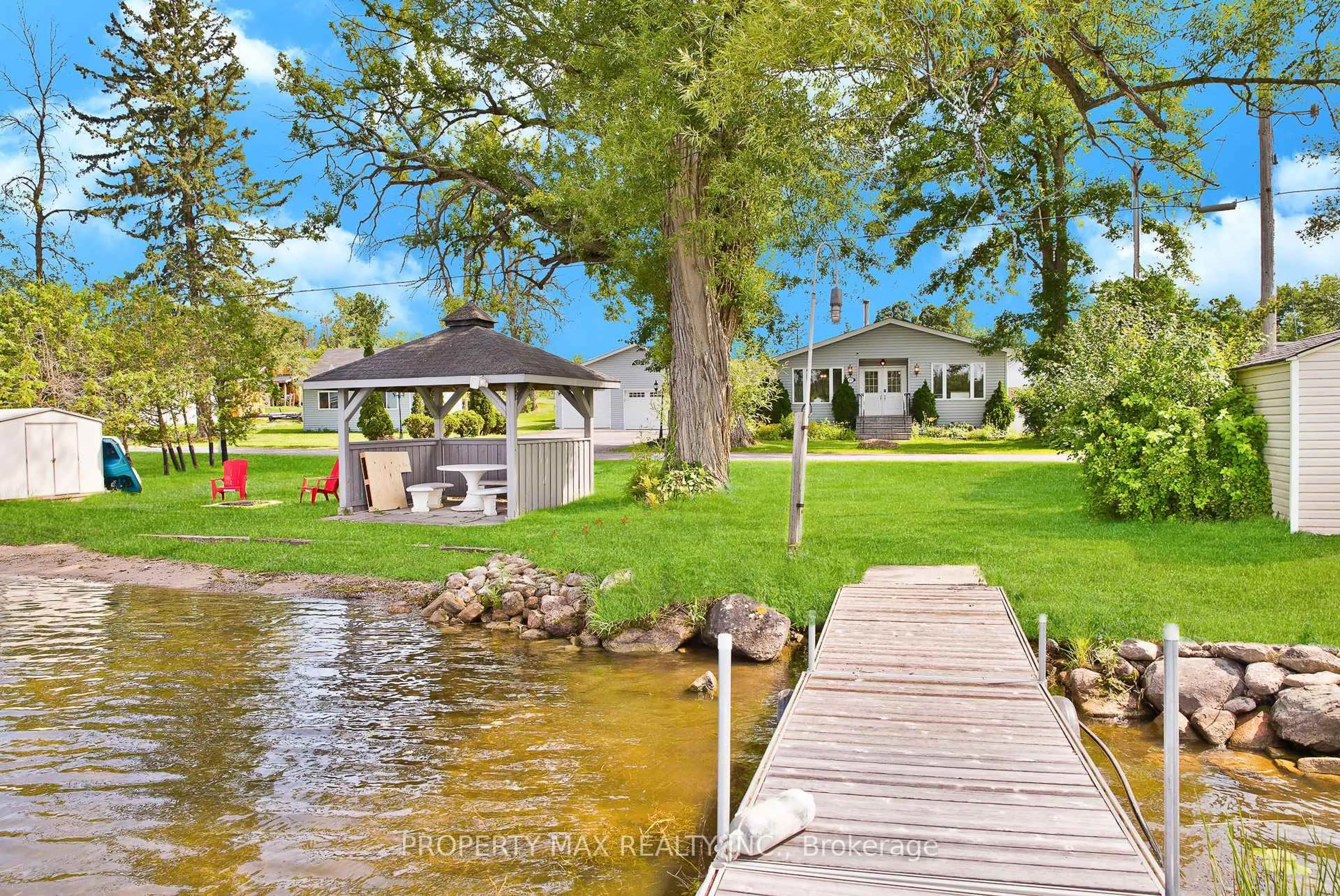 A pic from outside/outdoor area/front of a property/back of a property/a pic from drone, water/lake/river/ocean view for 27 Rose St, Hastings Ontario K0K 2C0