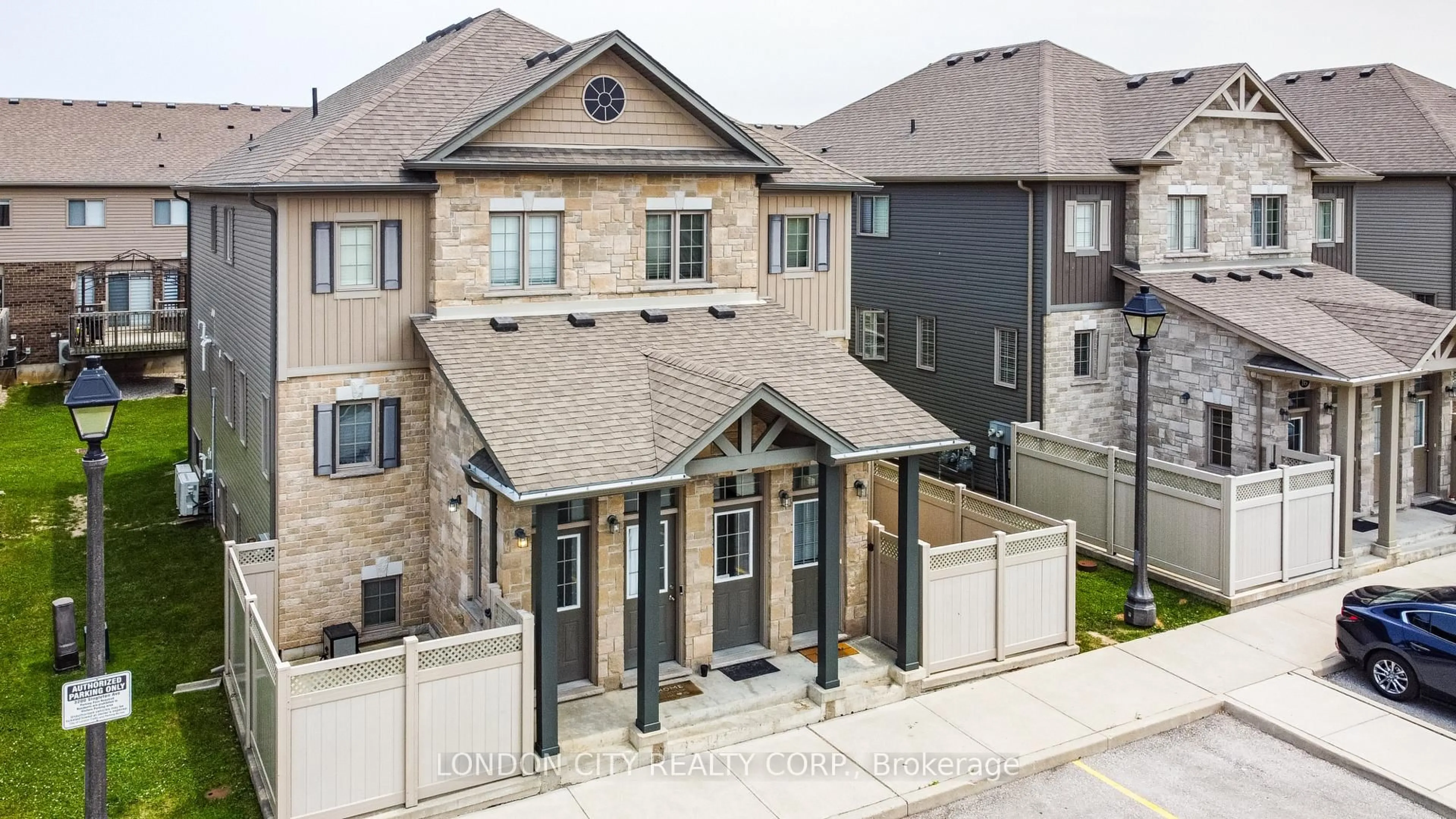 A pic from outside/outdoor area/front of a property/back of a property/a pic from drone, street for 3200 Singleton Ave #24, London South Ontario N6L 0C7