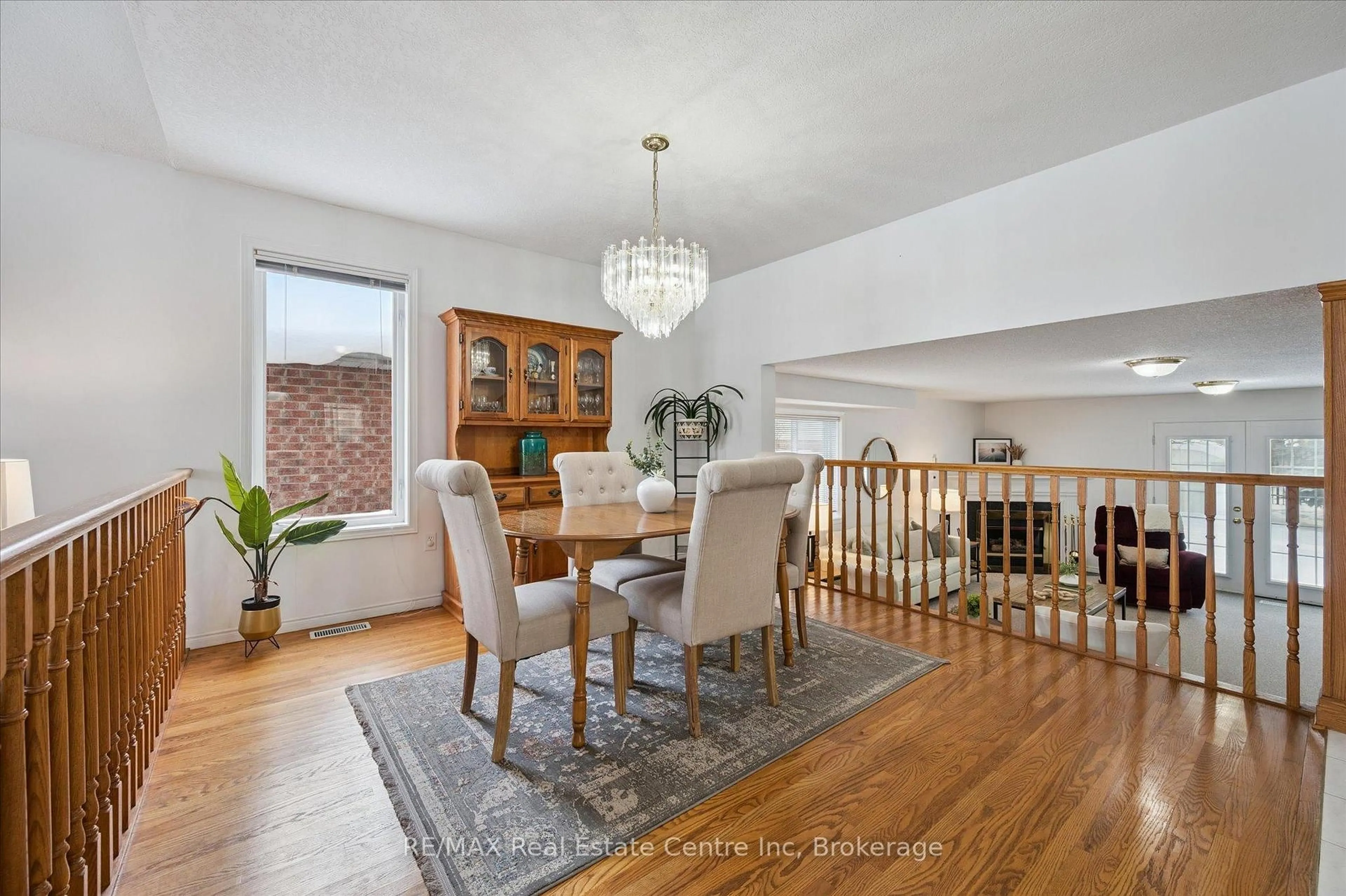 Dining room, wood/laminate floor for 19 Merganser Dr, Guelph Ontario N1C 1C8