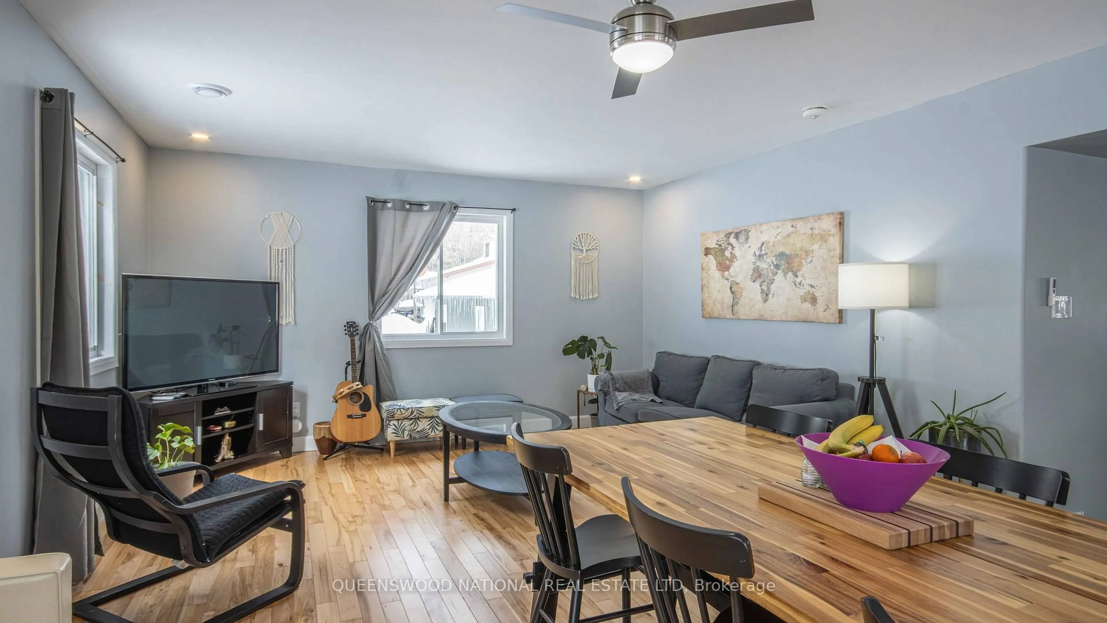 Living room with furniture, wood/laminate floor for 99 Inglis St, Barry's Bay Ontario K0J 1B0