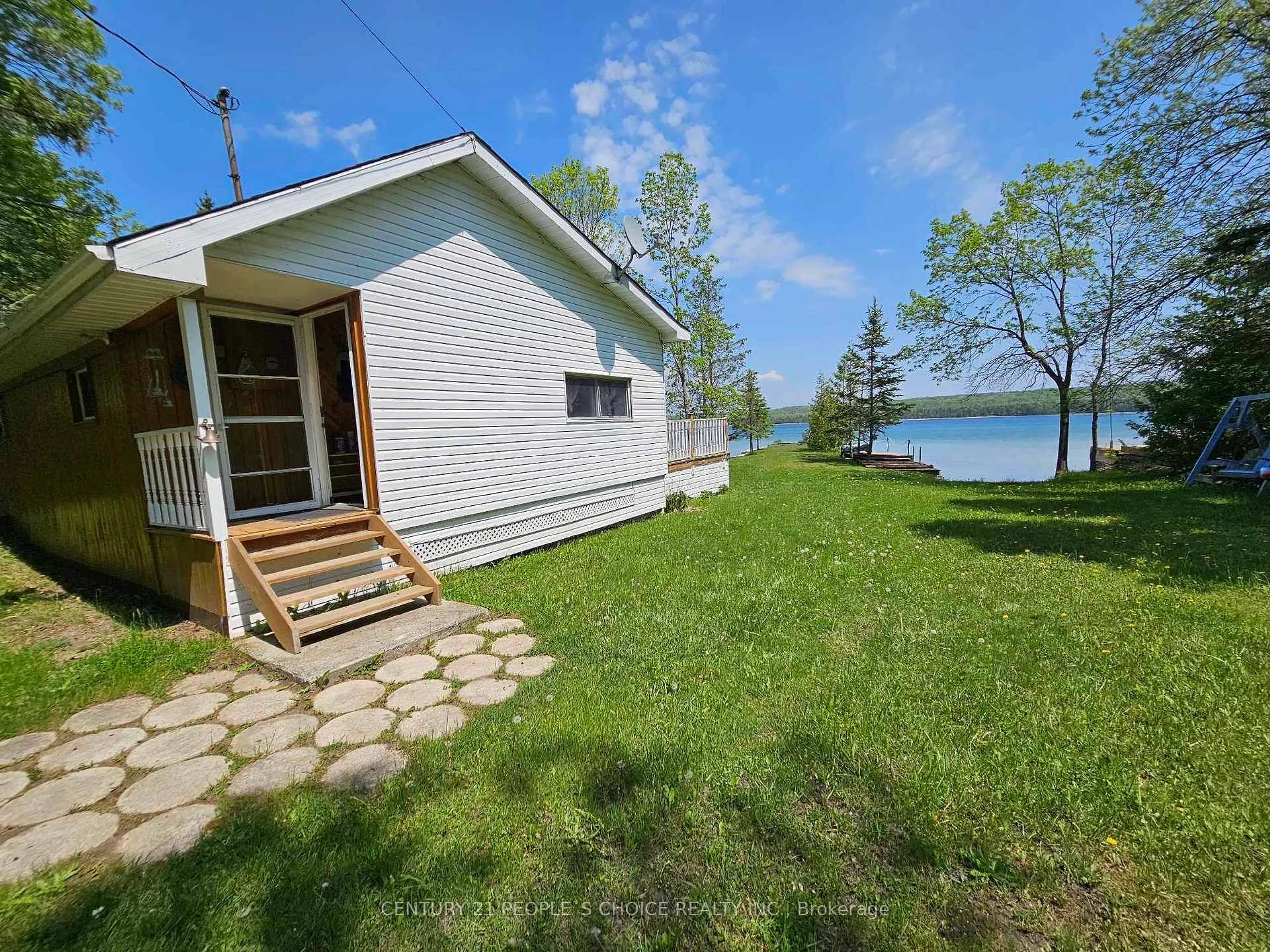 Patio, water/lake/river/ocean view for 123 Waterview Lane, Assiginack Ontario P0P 1N0