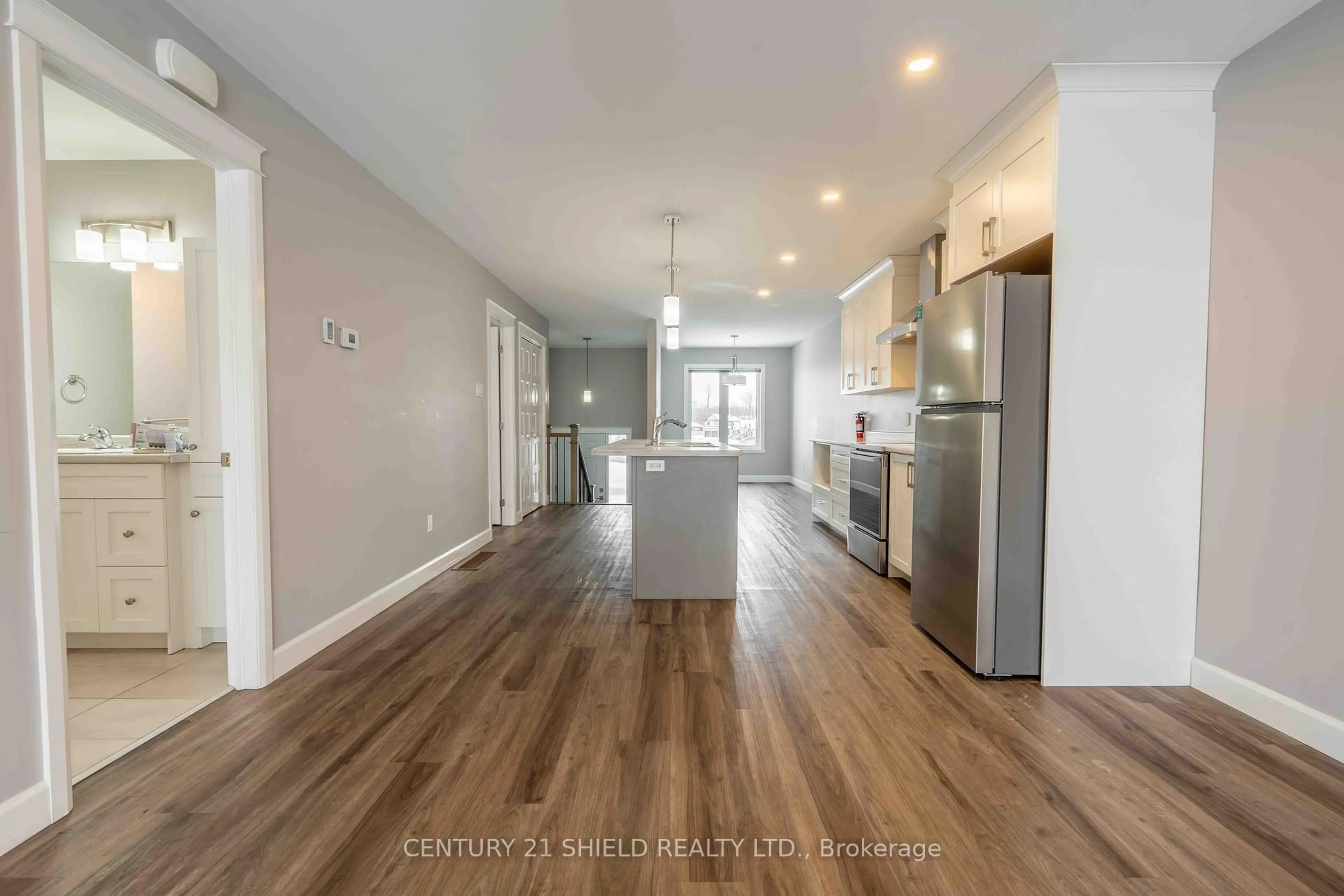 Open concept kitchen, wood/laminate floor for 238 East Ridge Dr, Cornwall Ontario K6H 7N2