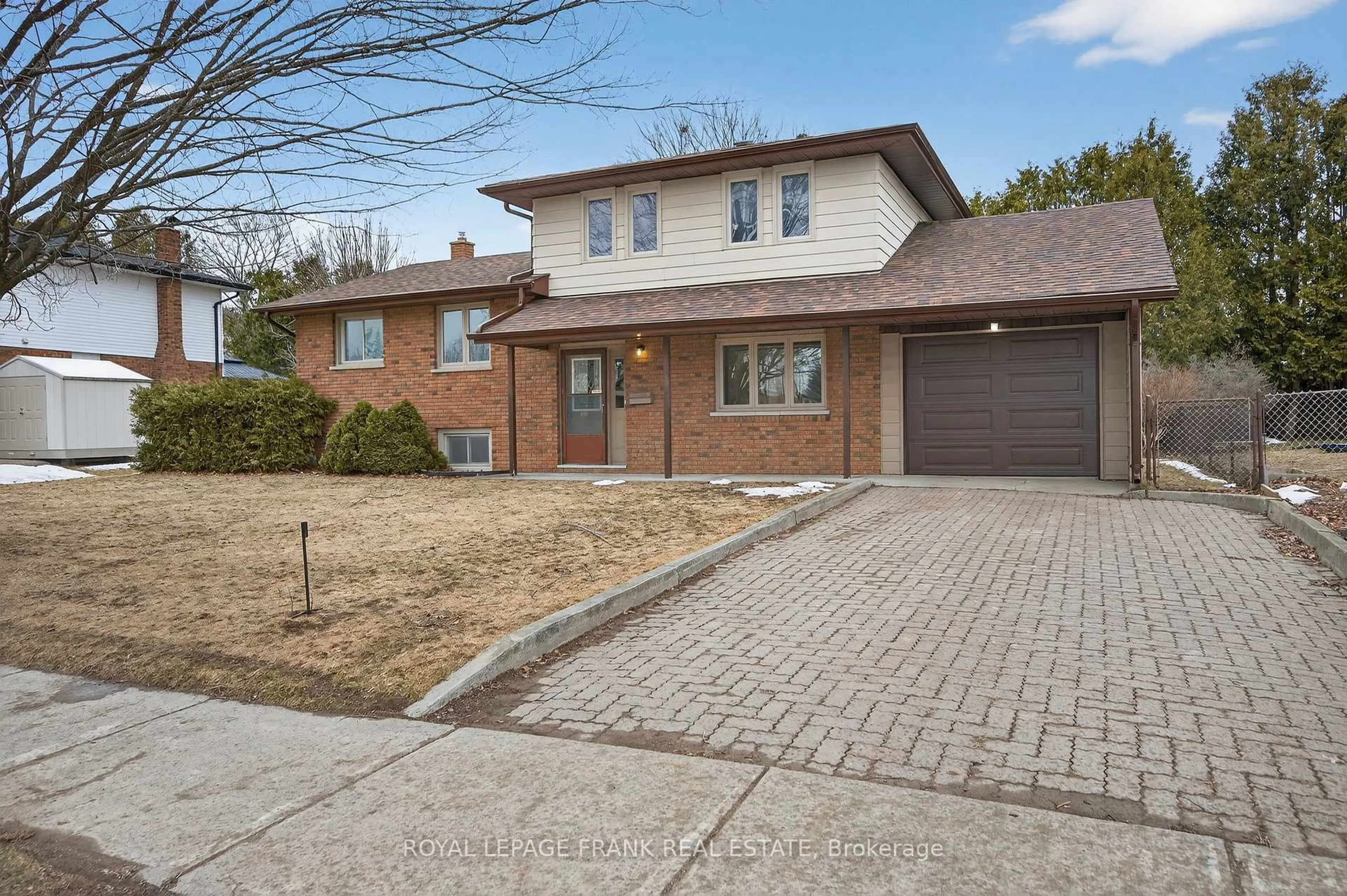 Home with brick exterior material, street for 2260 Kawartha Hts Blvd, Peterborough Ontario K9K 1P4