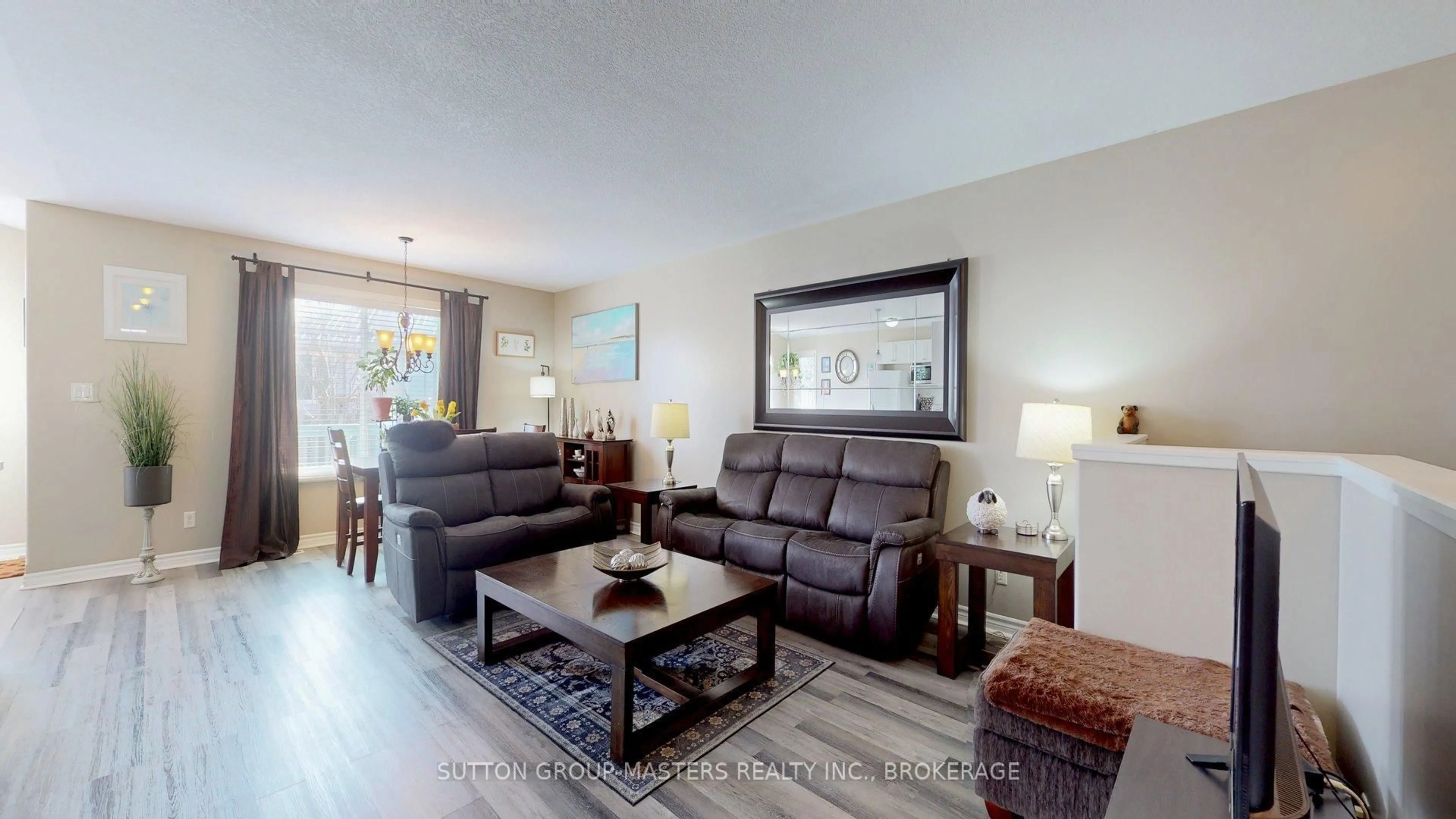 Living room with furniture, wood/laminate floor for 67 Eugene Crt, Kingston Ontario K7K 0A7