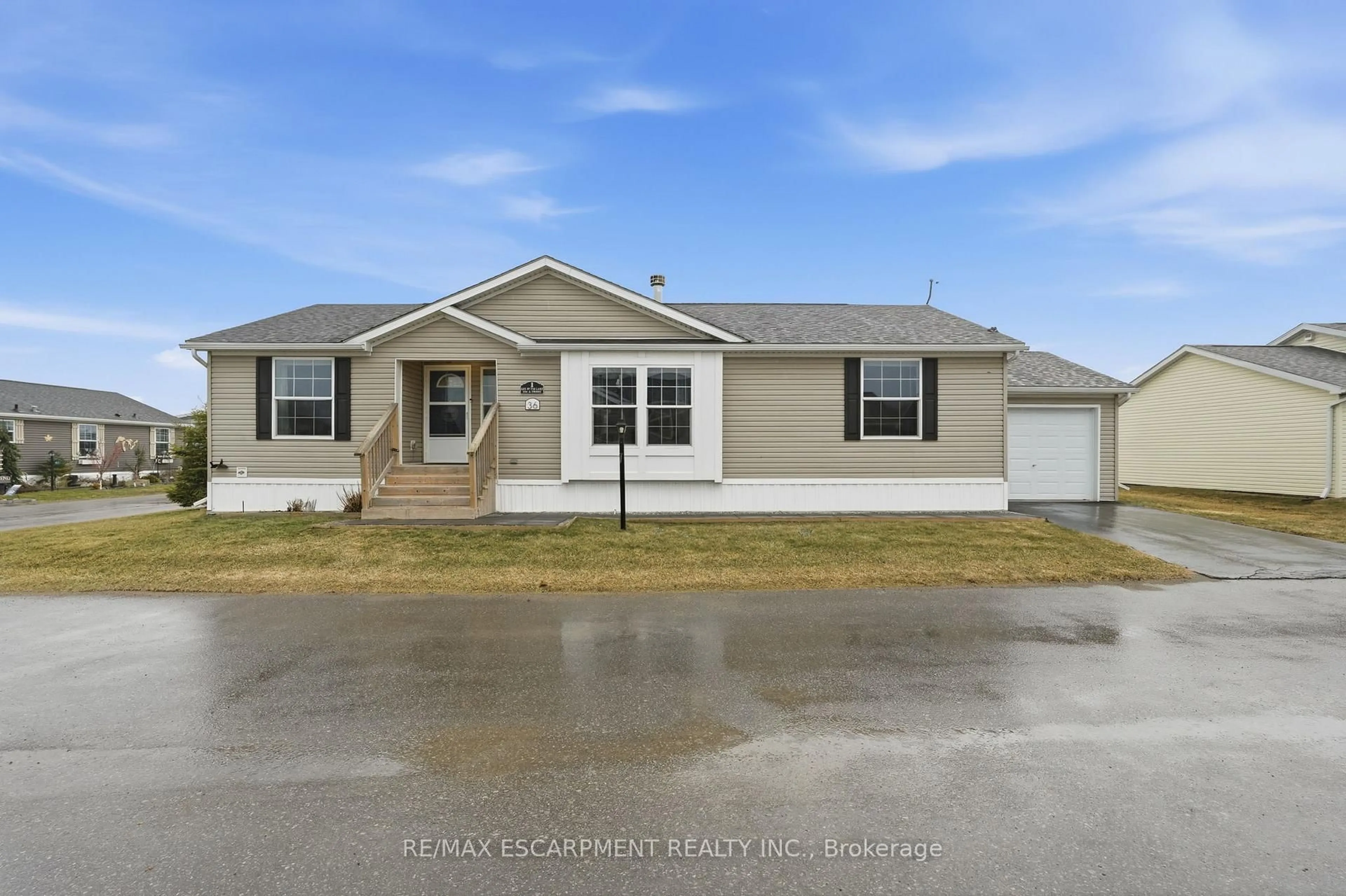 Home with vinyl exterior material, street for 36 Shady Lane, Haldimand Ontario N0A 1L0