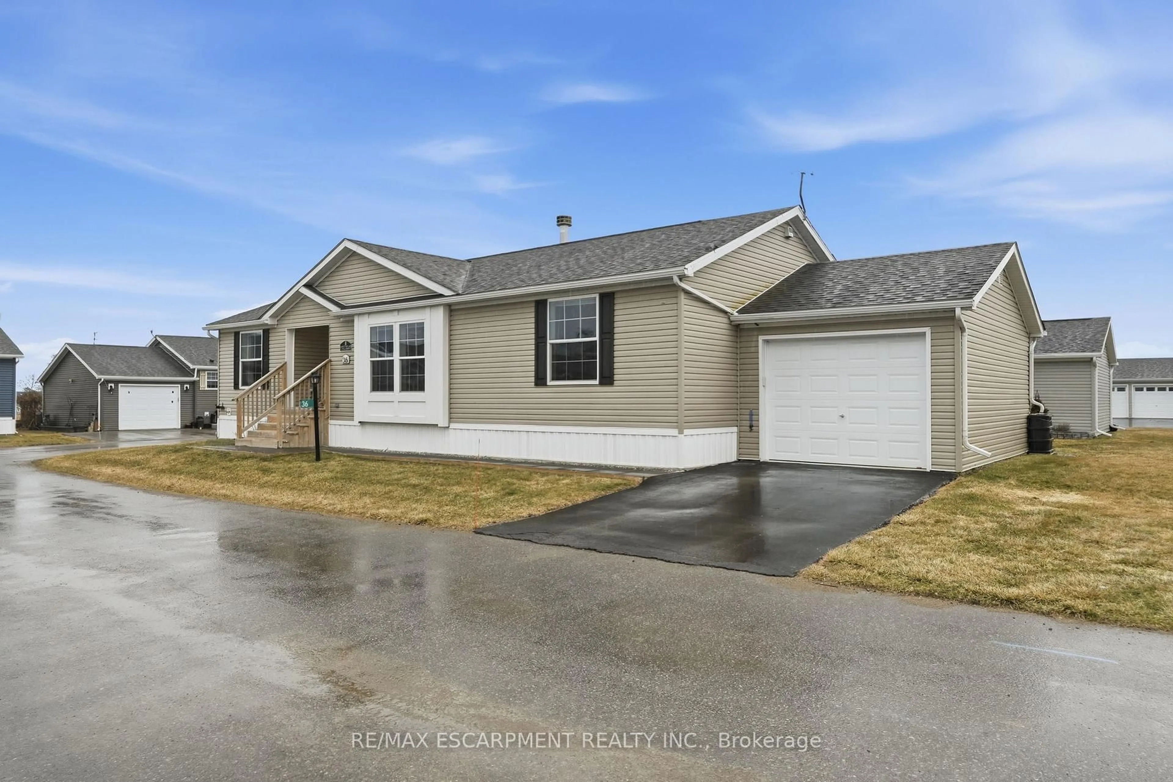 Home with vinyl exterior material, street for 36 Shady Lane, Haldimand Ontario N0A 1L0