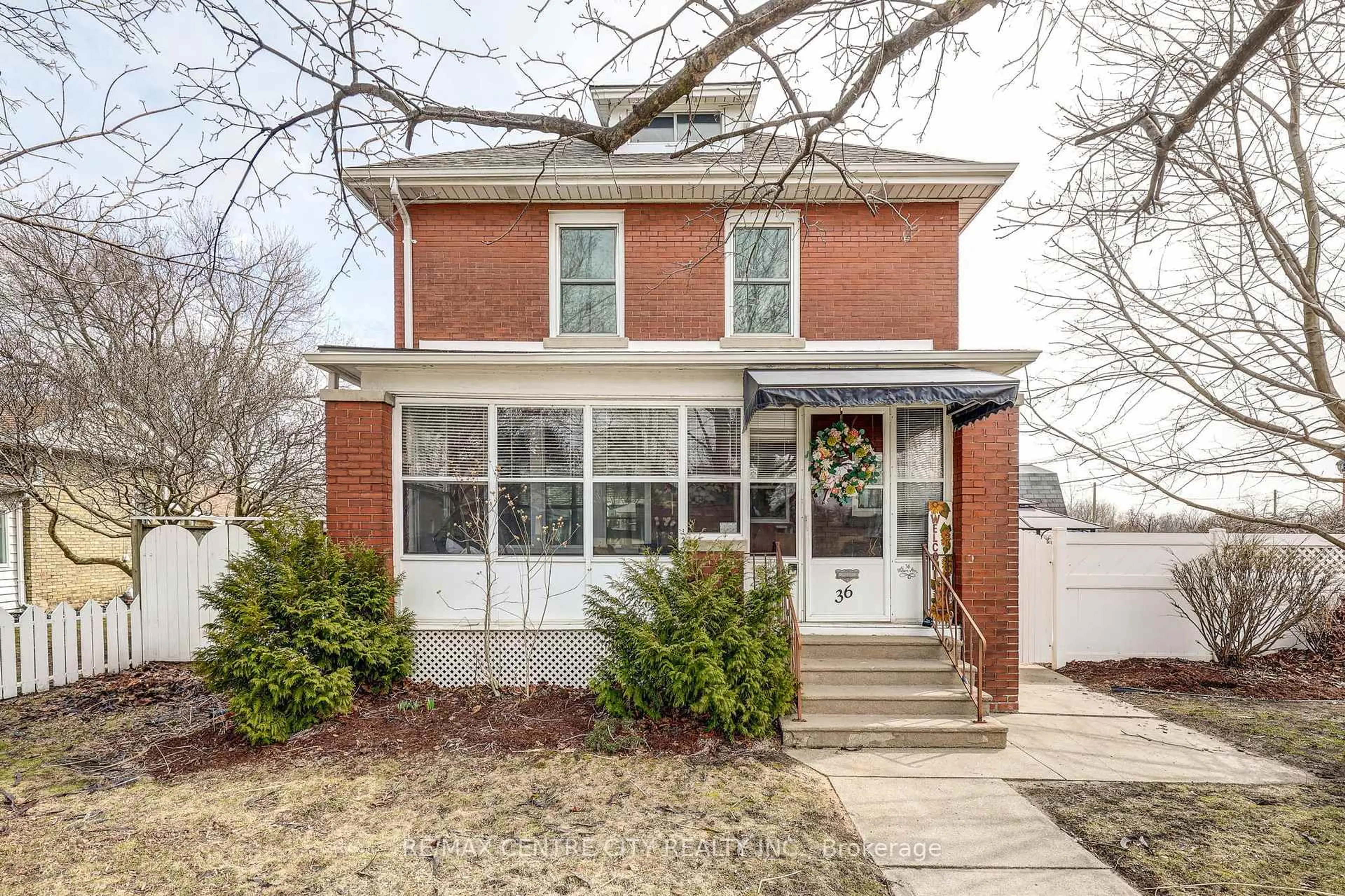 Home with brick exterior material, street for 36 Wilson Ave, St. Thomas Ontario N5R 3P8