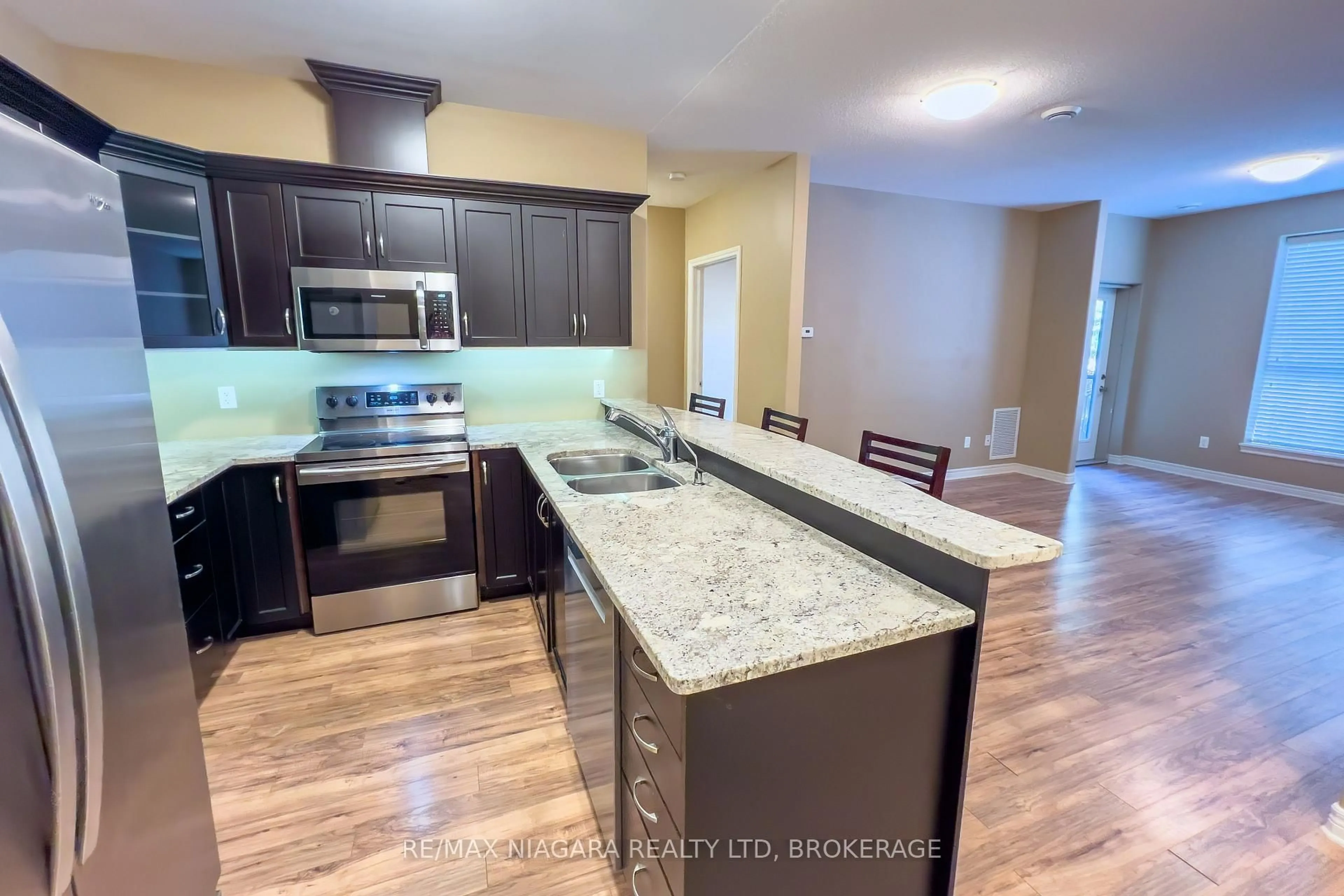 Open concept kitchen, unknown for 2799 St. Paul Ave #306, Niagara Falls Ontario L2J 2L3