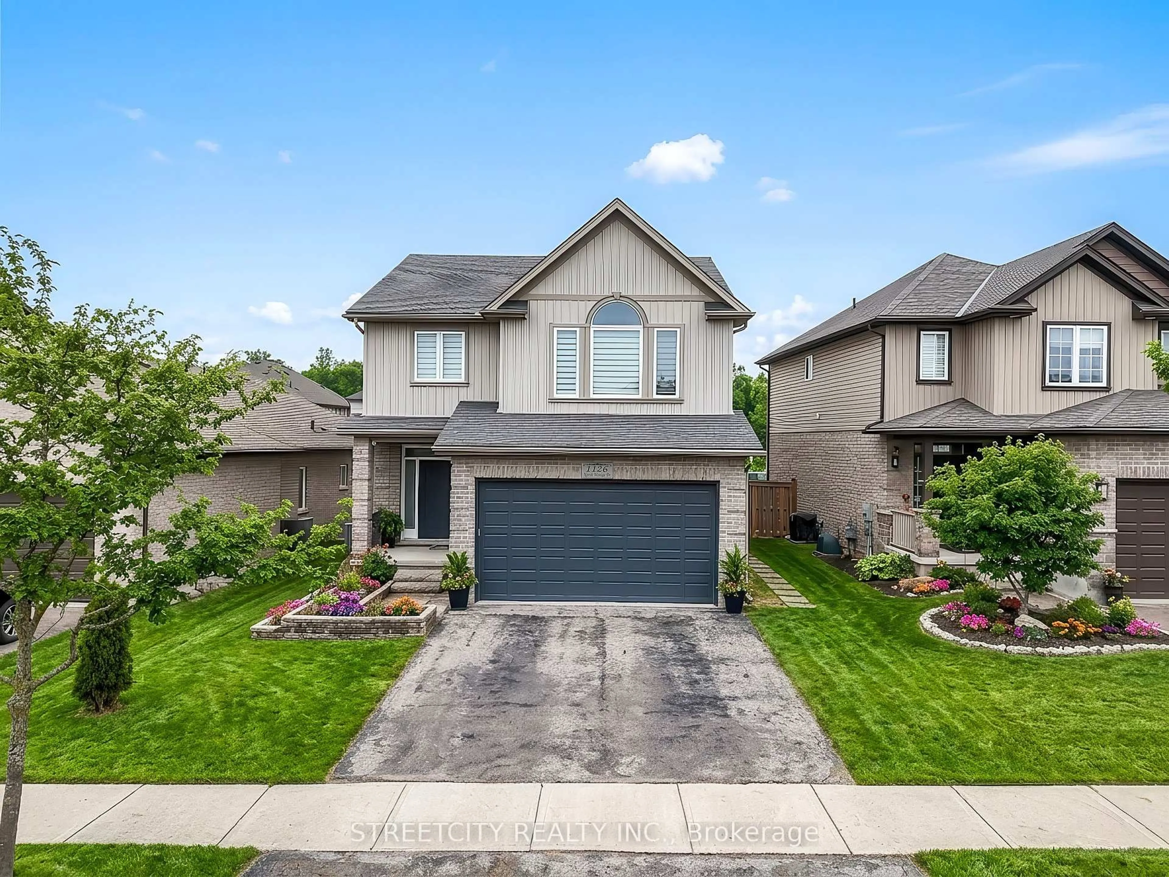 Home with brick exterior material, street for 1126 NORTH WENIGE Dr, London North Ontario N5X 4K5