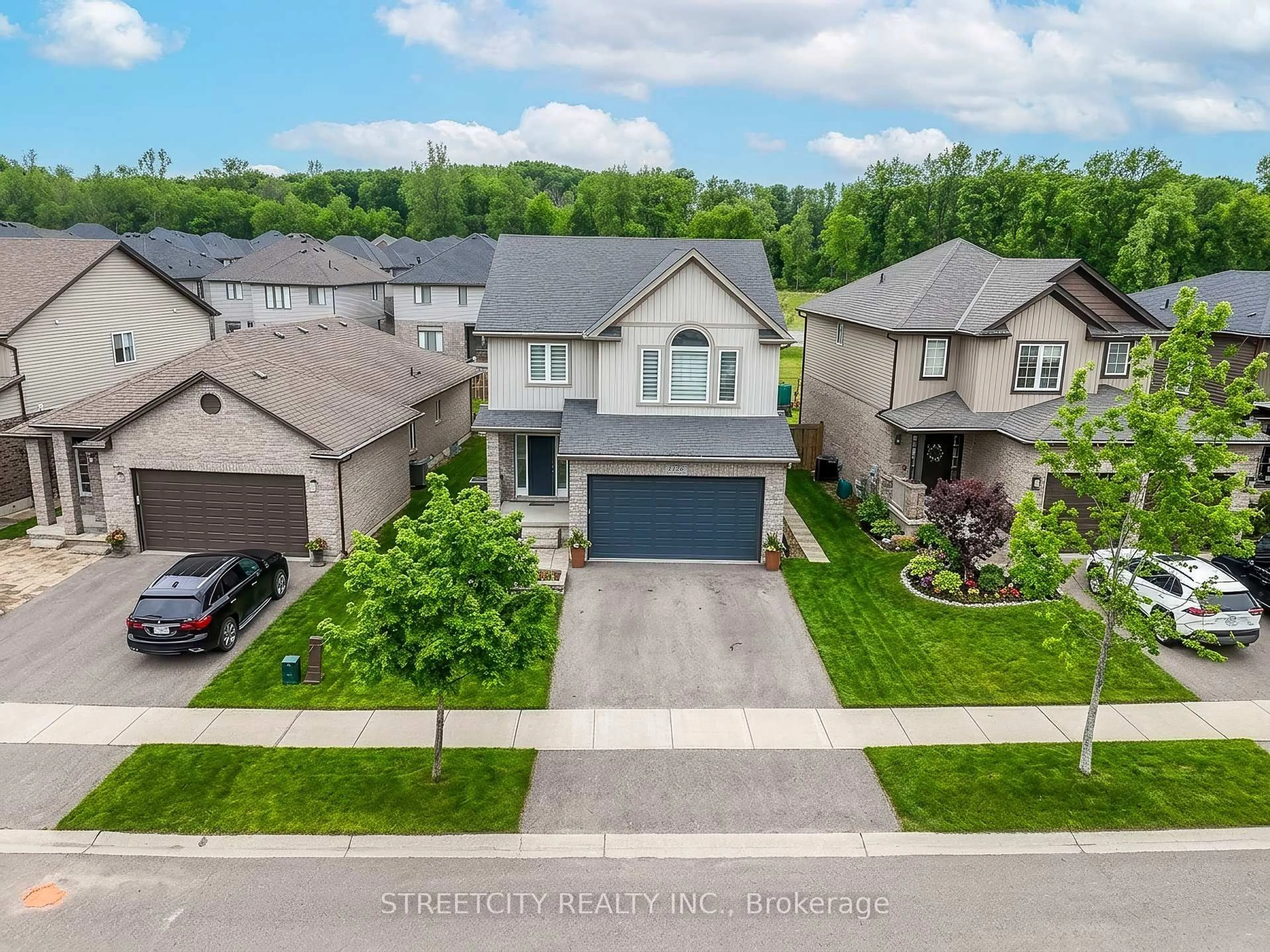 A pic from outside/outdoor area/front of a property/back of a property/a pic from drone, street for 1126 NORTH WENIGE Dr, London North Ontario N5X 4K5