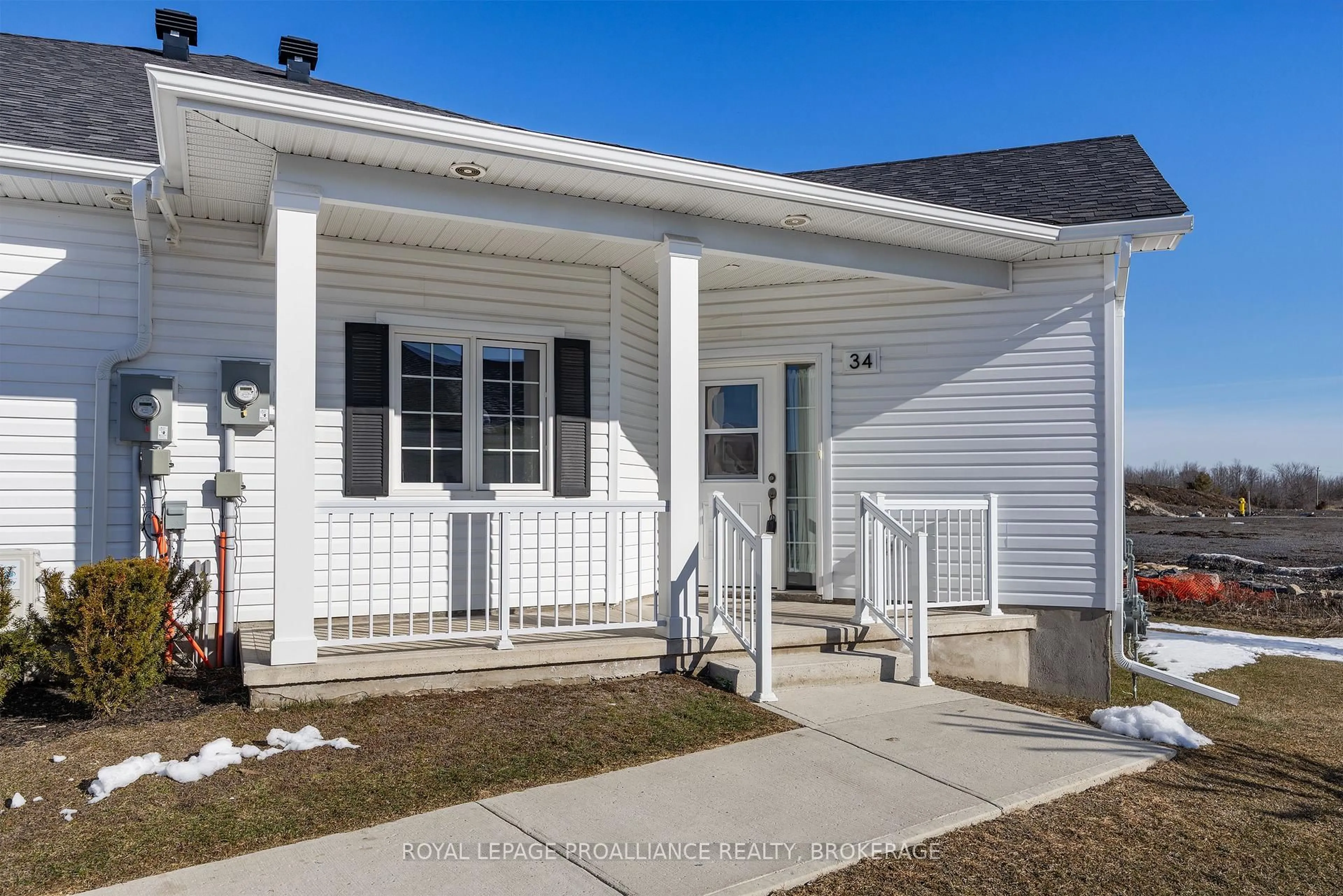 Home with vinyl exterior material, street for 34 Lowry Pl #49, Loyalist Ontario K7N 1R5