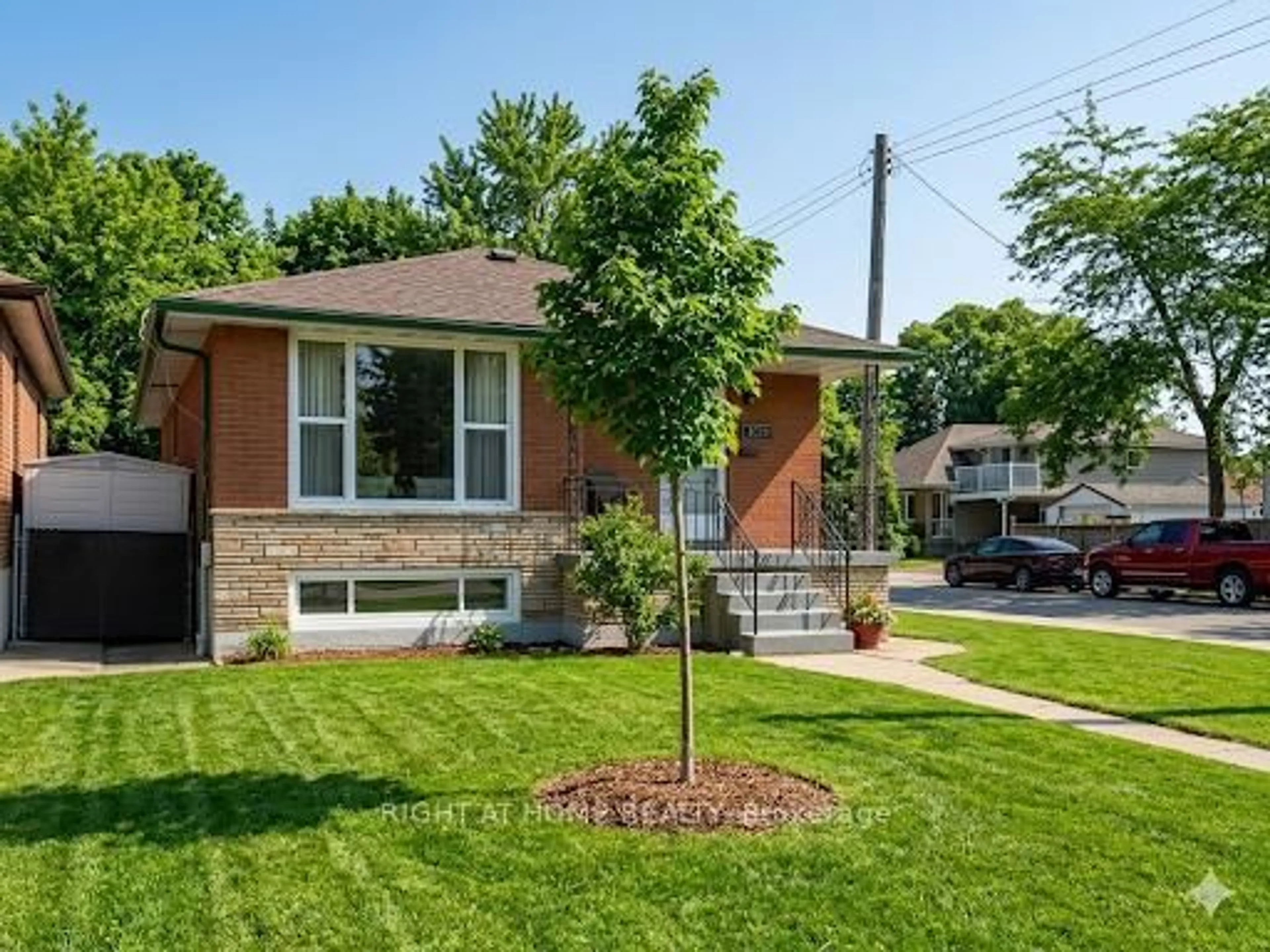 Home with brick exterior material, street for 1224 Dunsmure Rd, Hamilton Ontario L8H 1L6