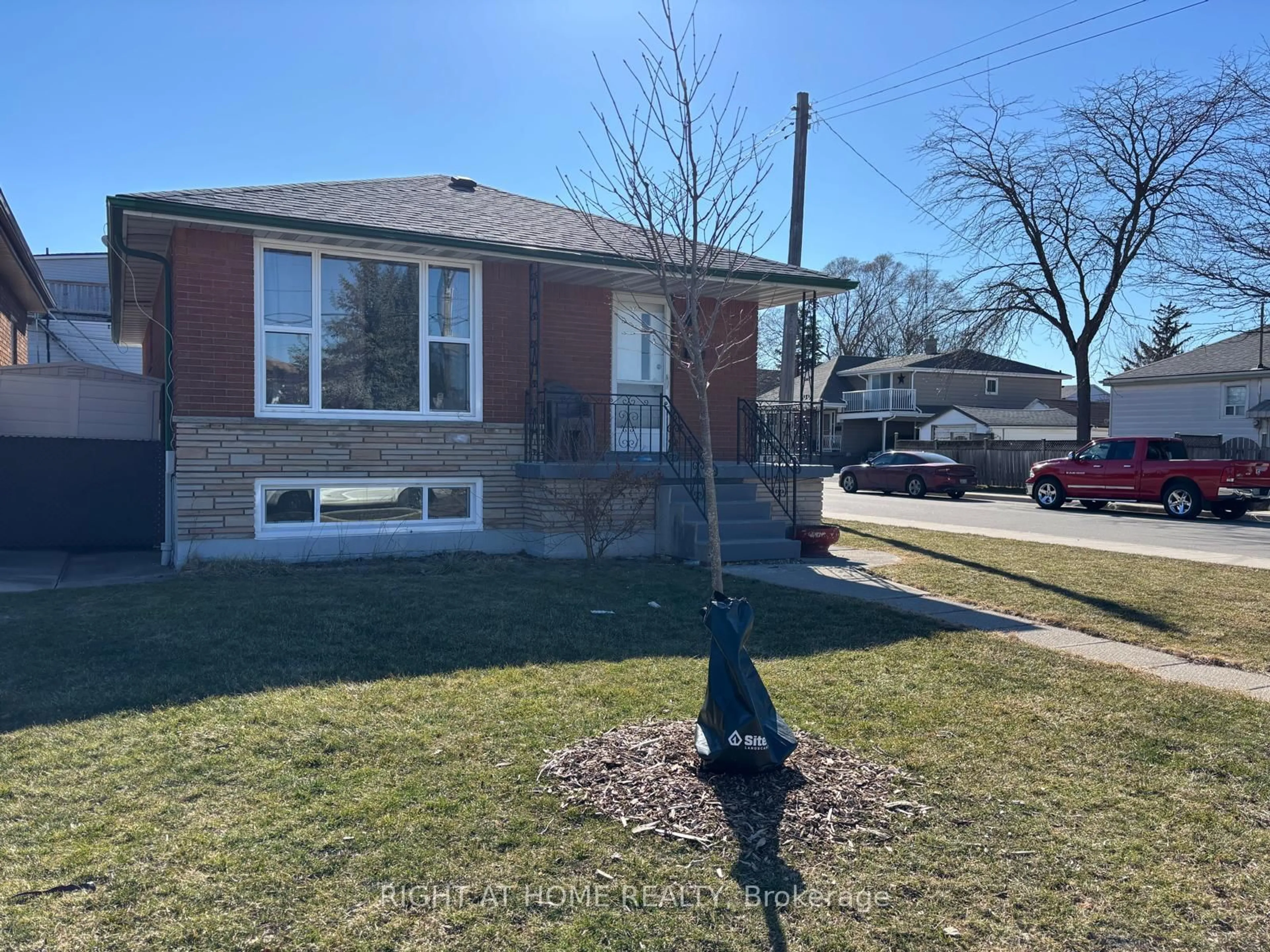 Home with brick exterior material, street for 1224 Dunsmure Rd, Hamilton Ontario L8H 1L6