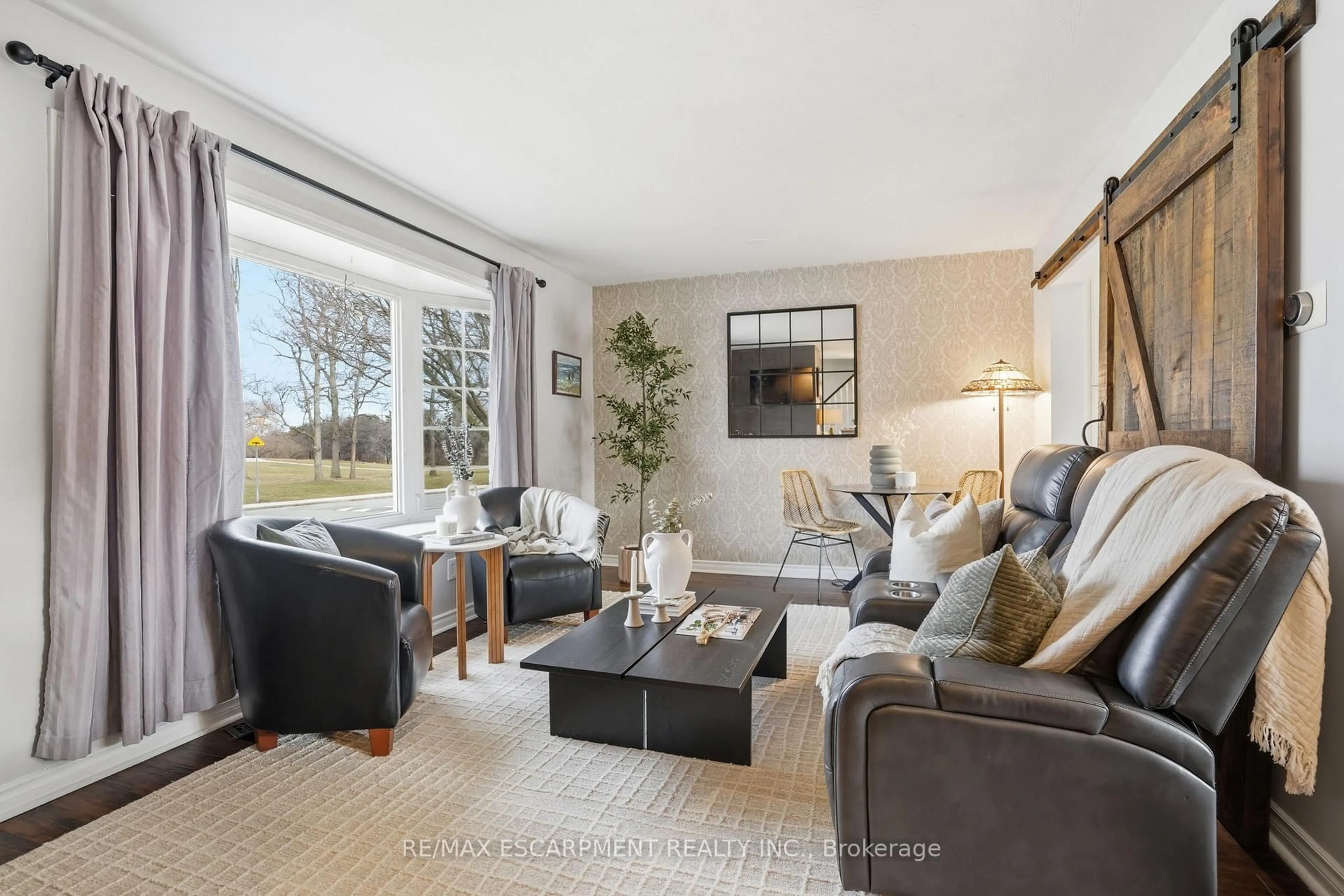 Living room with furniture, unknown for 65 Rolston Dr, Hamilton Ontario L9C 3X6