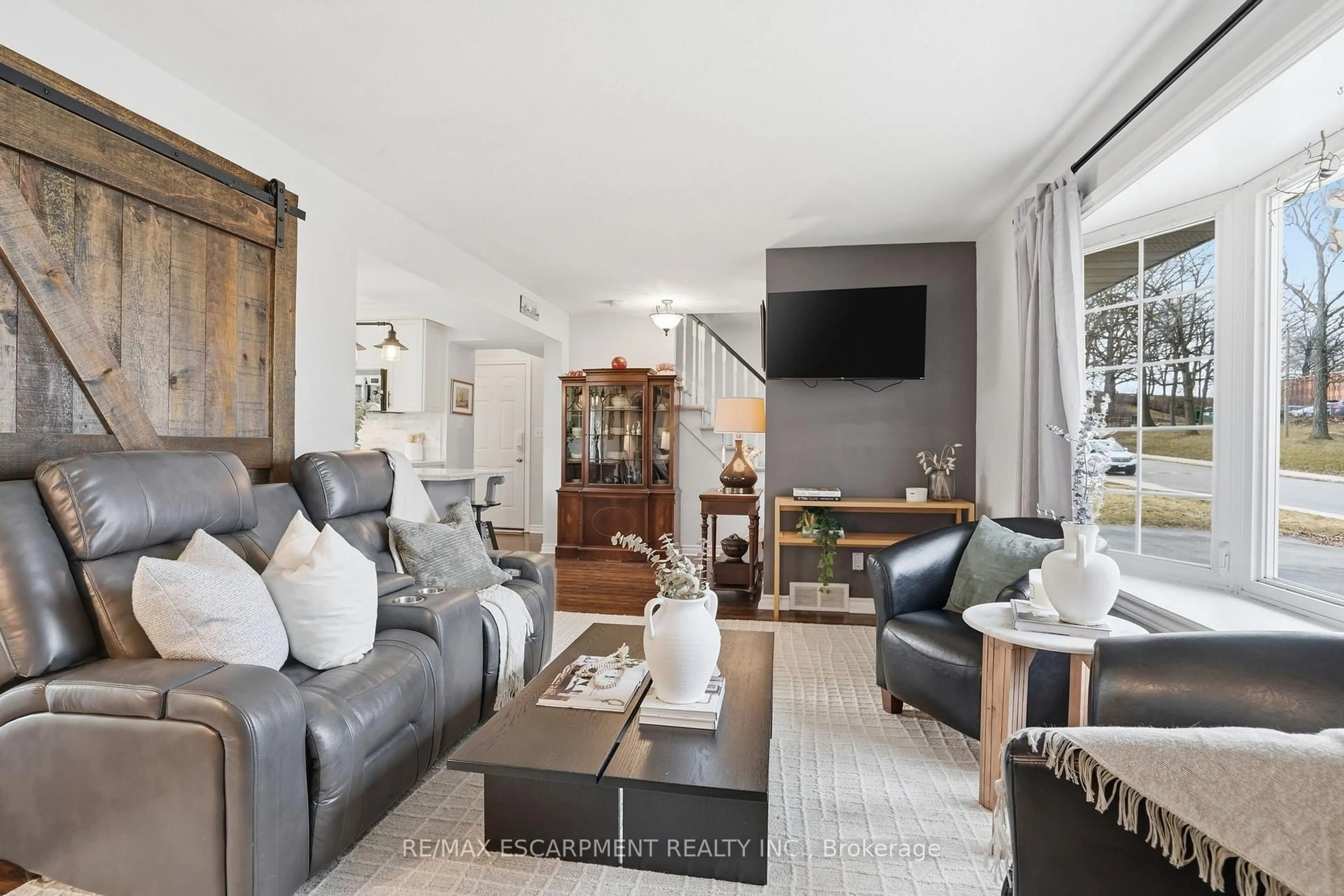 Living room with furniture, unknown for 65 Rolston Dr, Hamilton Ontario L9C 3X6