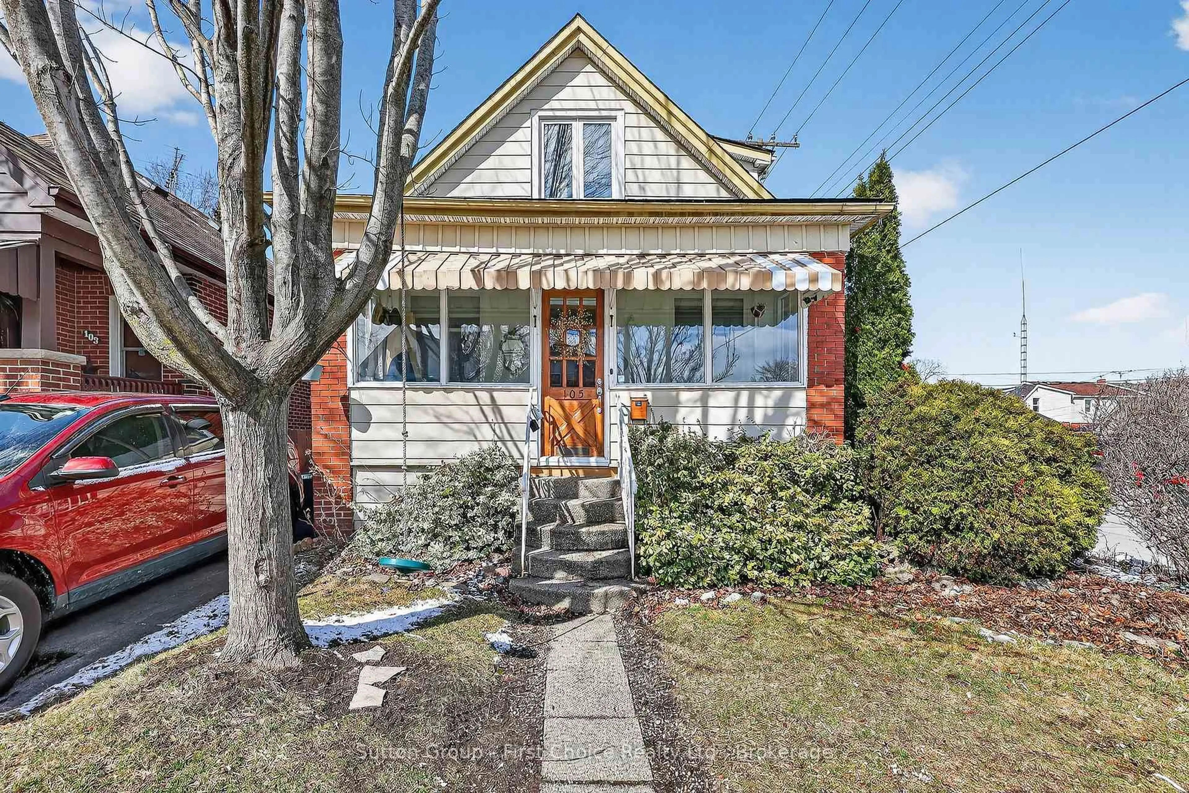 Home with brick exterior material, street for 105 Barons Ave, Hamilton Ontario L8H 5A5