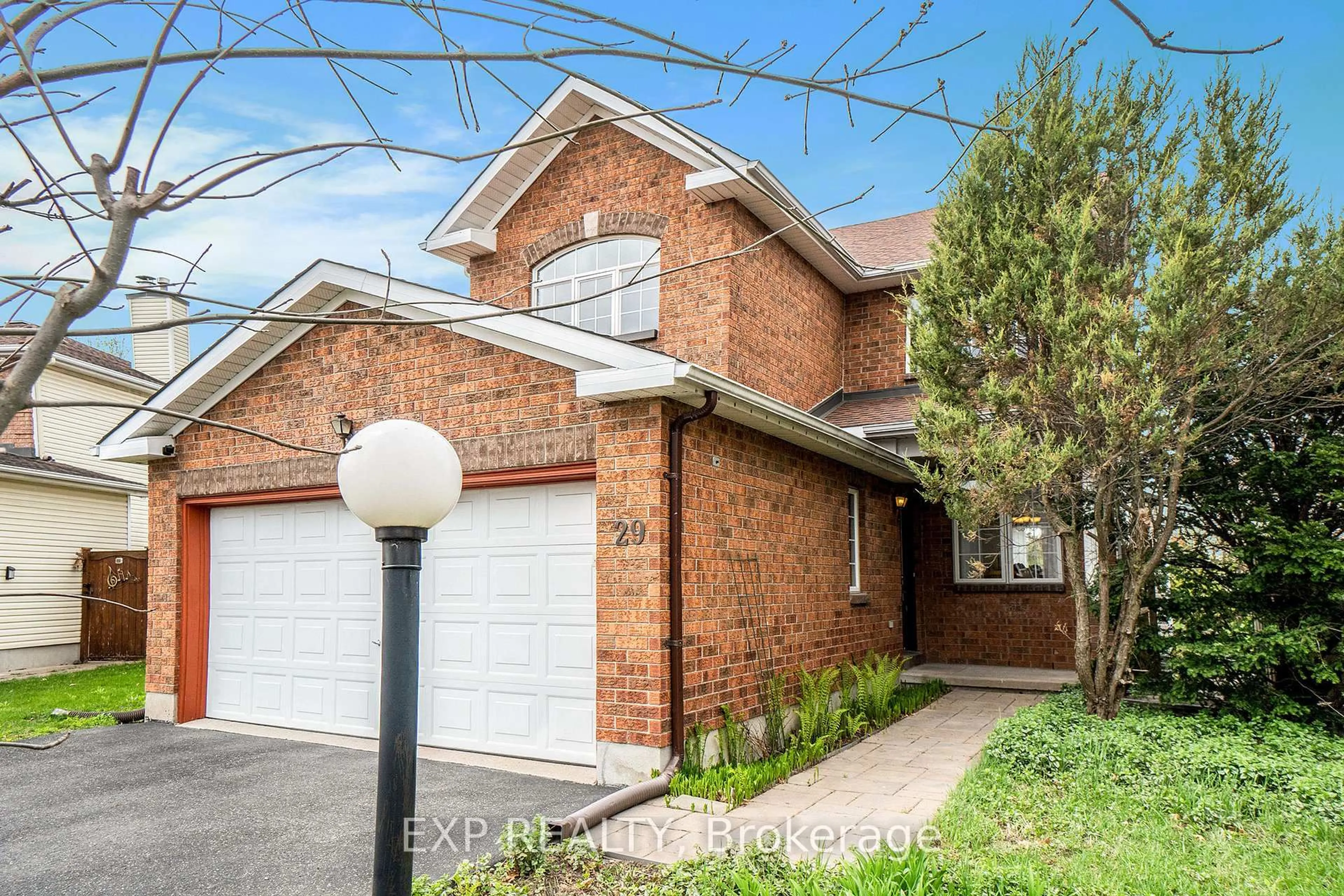 Home with brick exterior material, street for 29 Woodford Way, Ottawa Ontario K2J 4B9