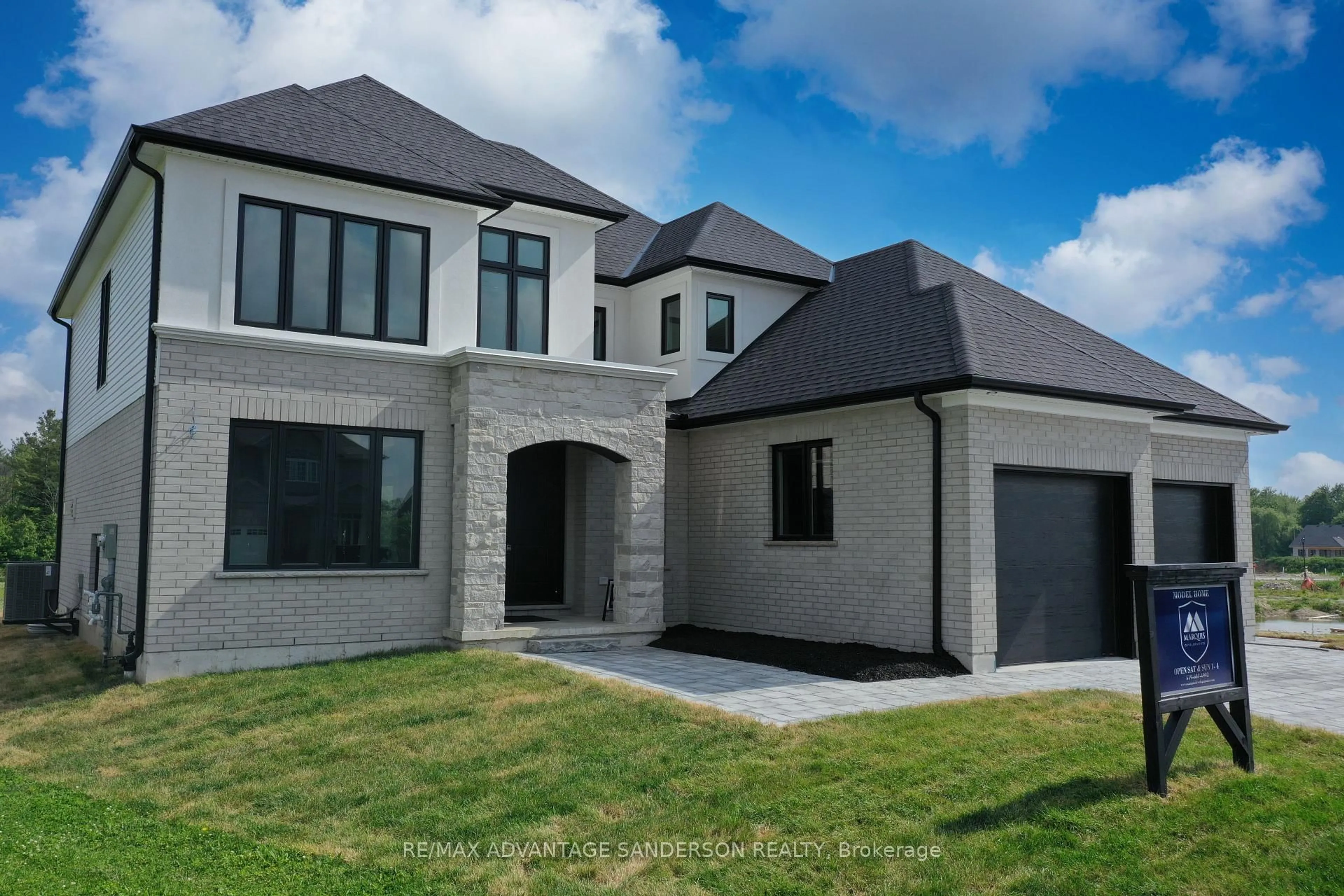 Home with brick exterior material, street for 243 Songbird Lane, Middlesex Centre Ontario N0M 2A0