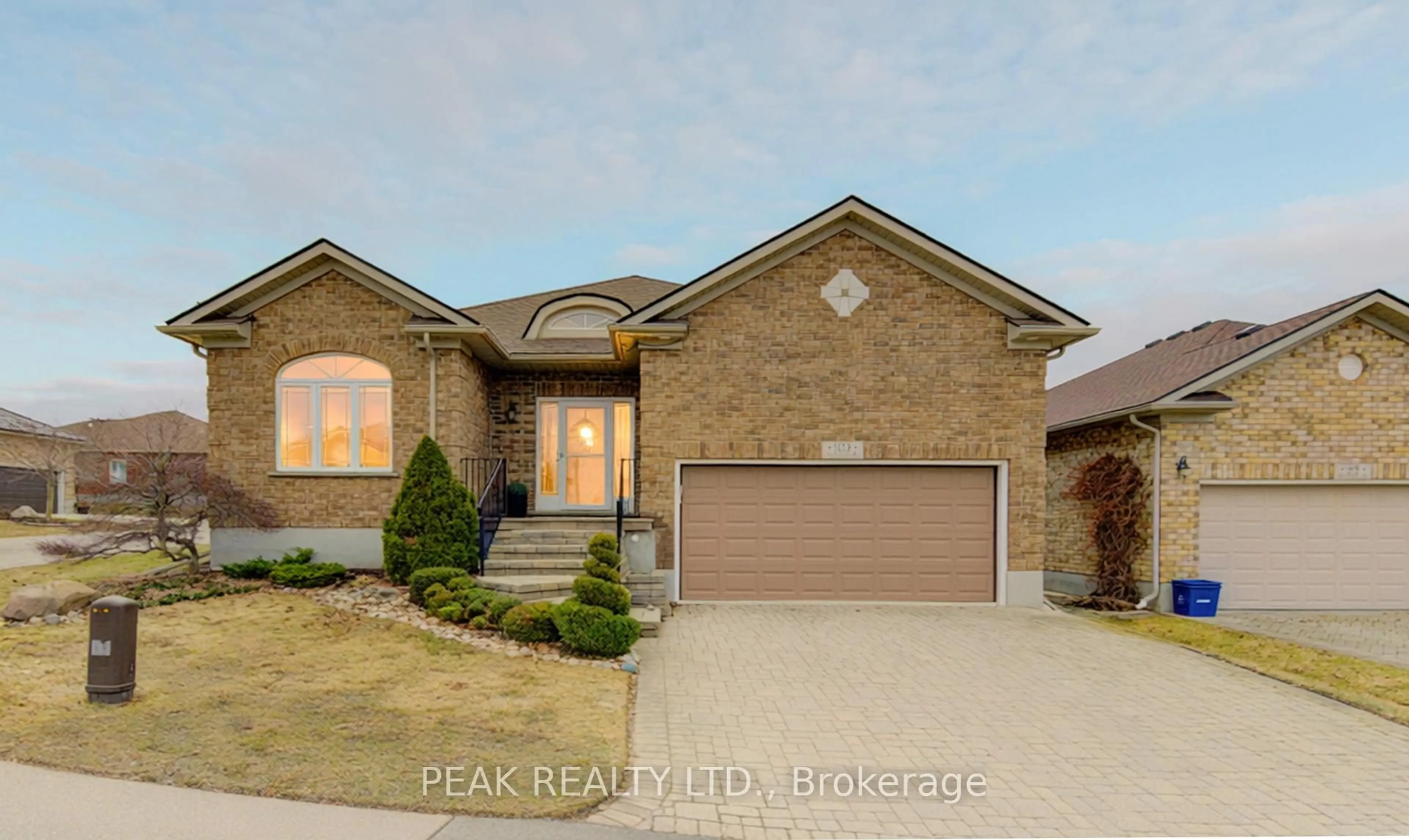 Home with brick exterior material, street for 103 Devonshire Dr, Wilmot Ontario N3A 4J6