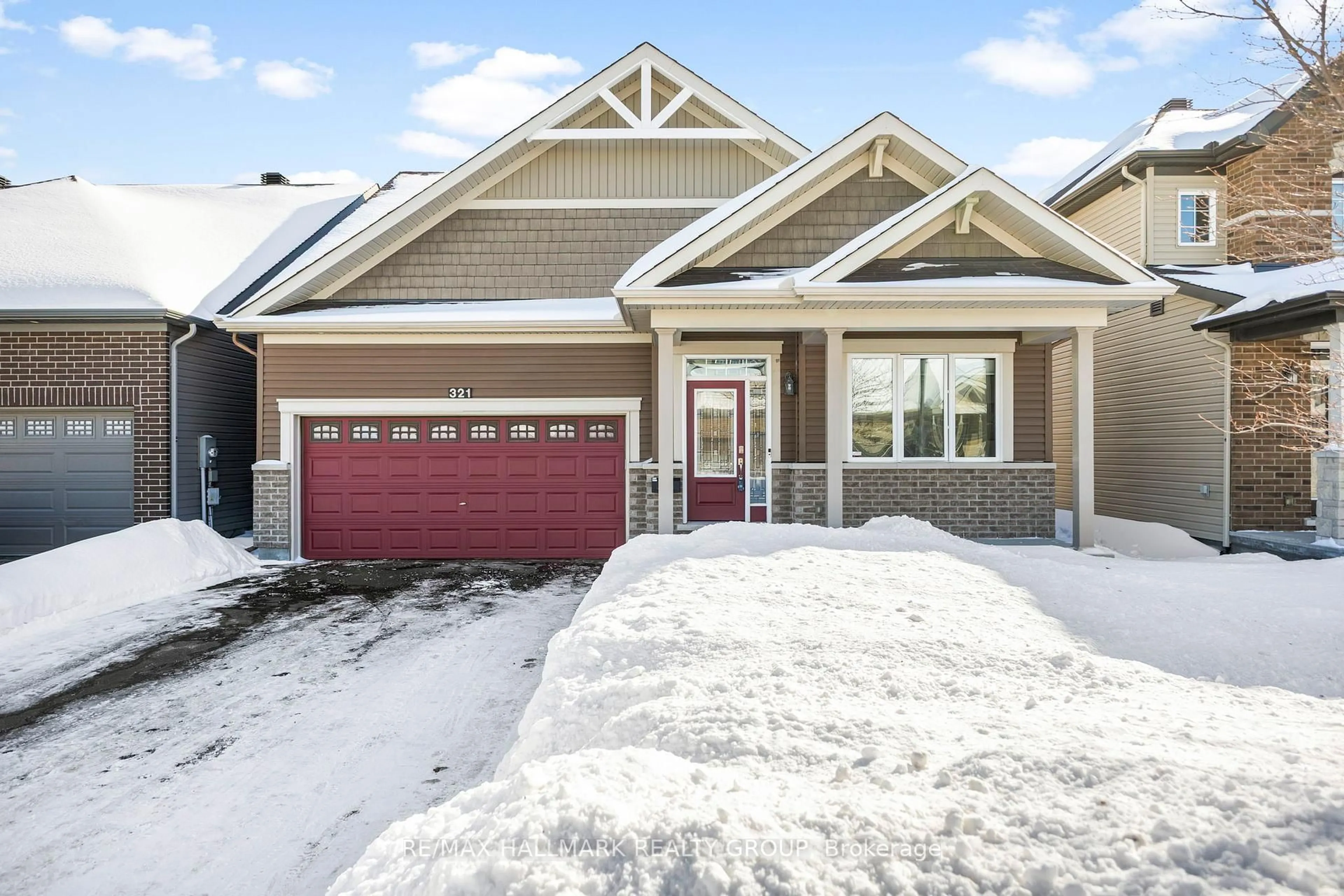 Home with brick exterior material, street for 321 Hepatica Way, Ottawa Ontario K4A 0Y9