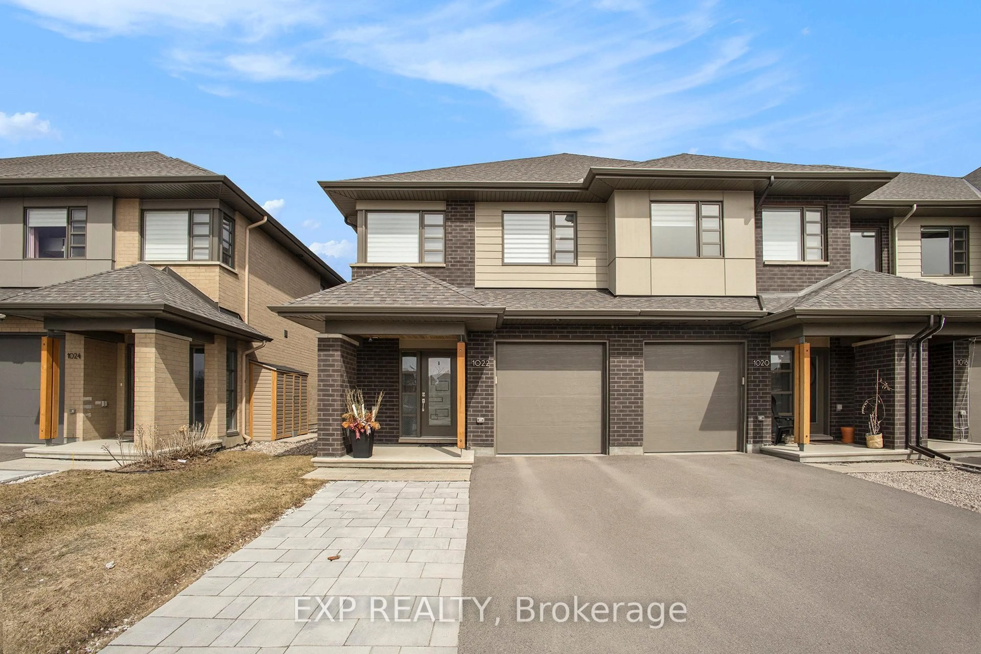 Home with brick exterior material, street for 1022 Lunar Glow Cres, Ottawa Ontario K4M 0J9