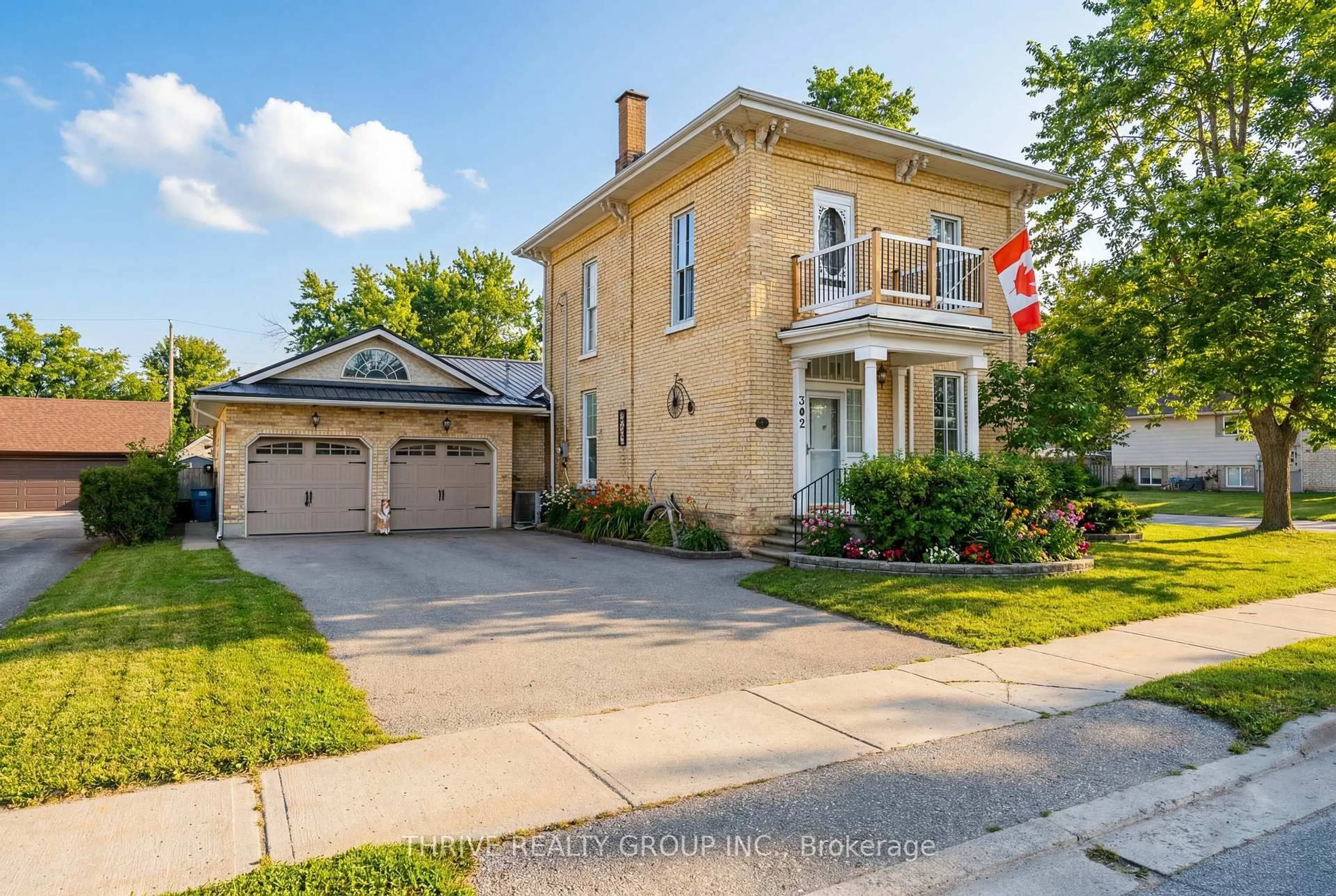 Home with brick exterior material, street for 302 TALBOT St, Aylmer Ontario N5H 1H9